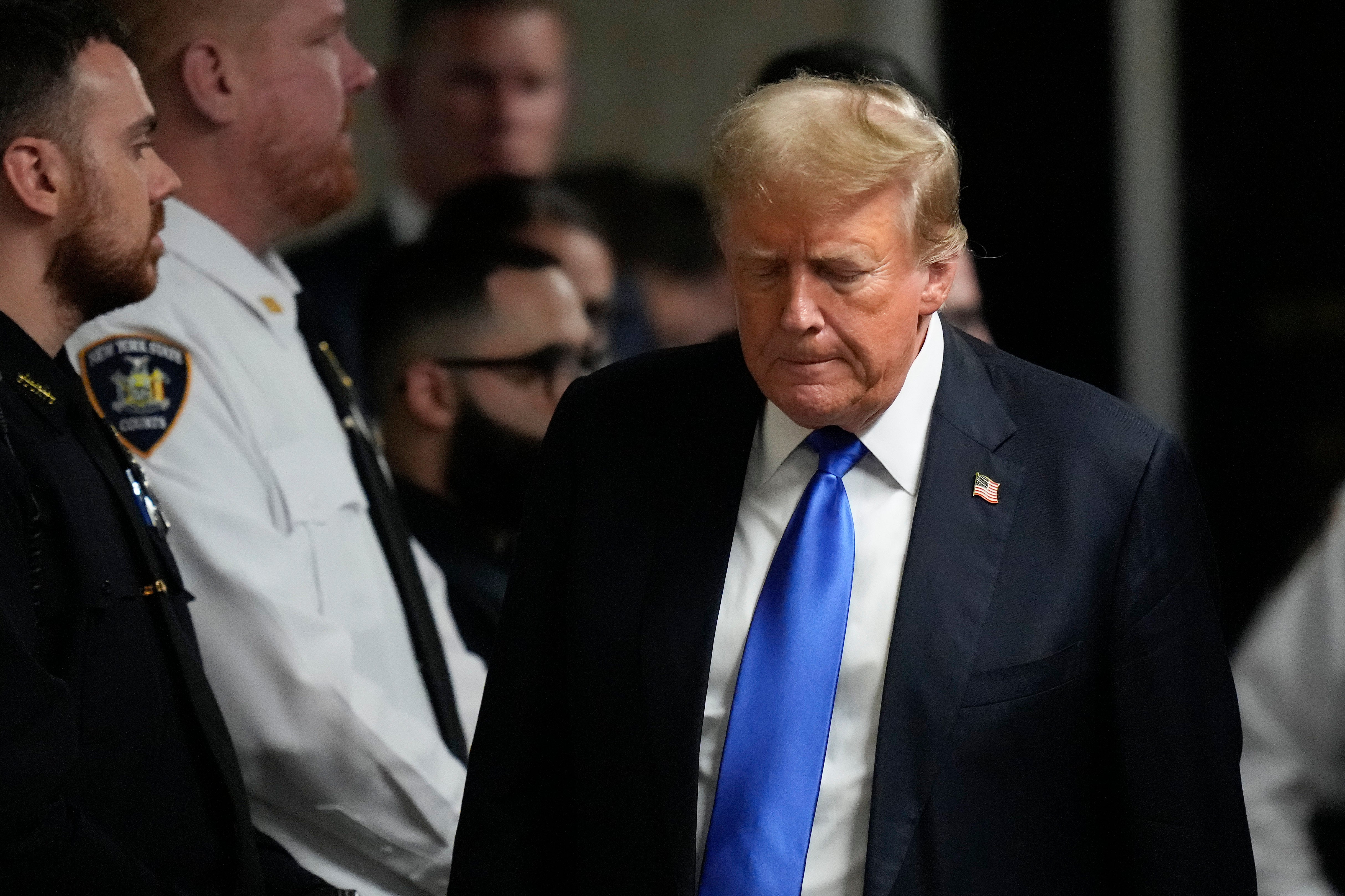 Former President Donald Trump walks to make comments to media after being found guilty on 34 felony counts of falsifying business records in the first degree at Manhattan Criminal Court, Thursday, May 30, 2024, in New York