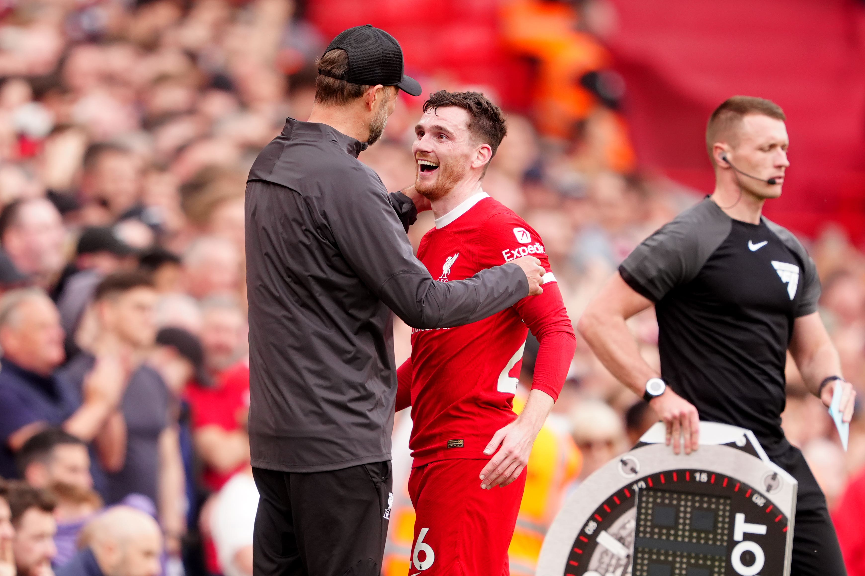 Andy Robertson, centre, with former Liverpool boss Jurgen Klopp (Peter Byrne/PA)