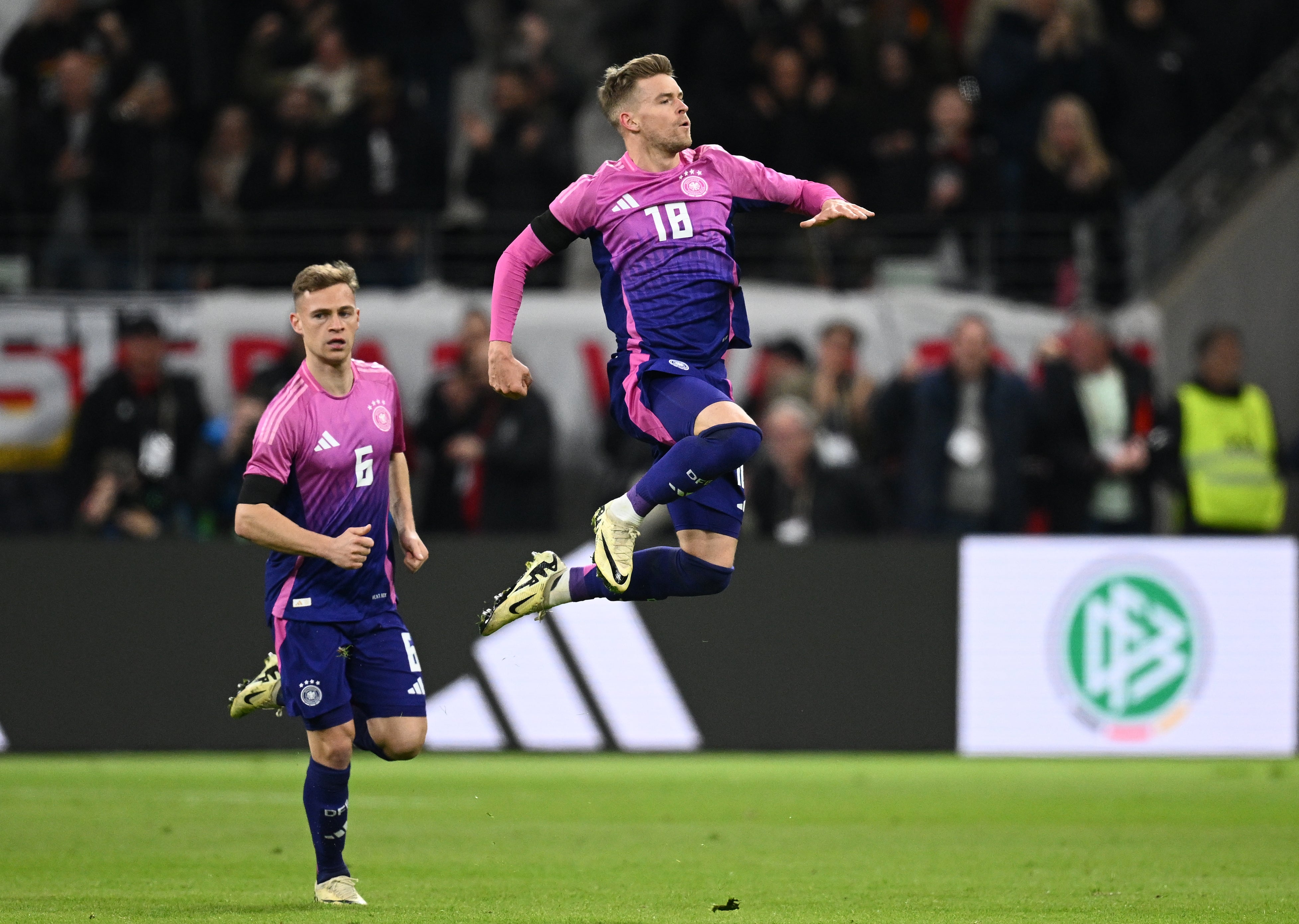 Max Mittelstädt (right) celebrates his equaliser against Netherlands