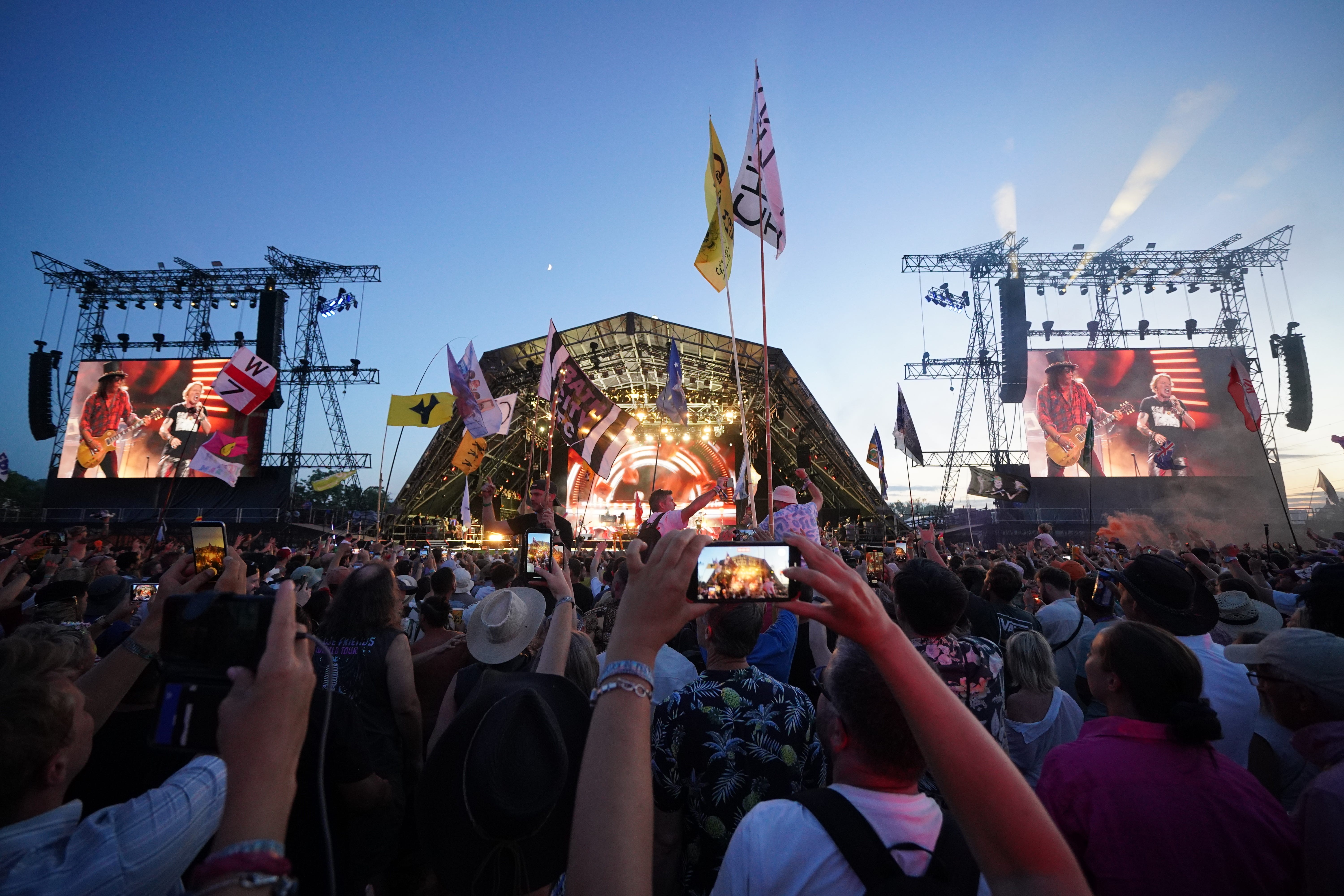 Fans celebrate during a performance on the Pyramid Stage, Glastonbury 2023