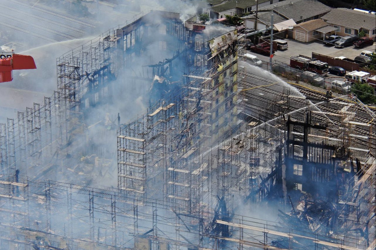 Pictures showed the large structure gutted and smoking, as fire crews remained on the scene