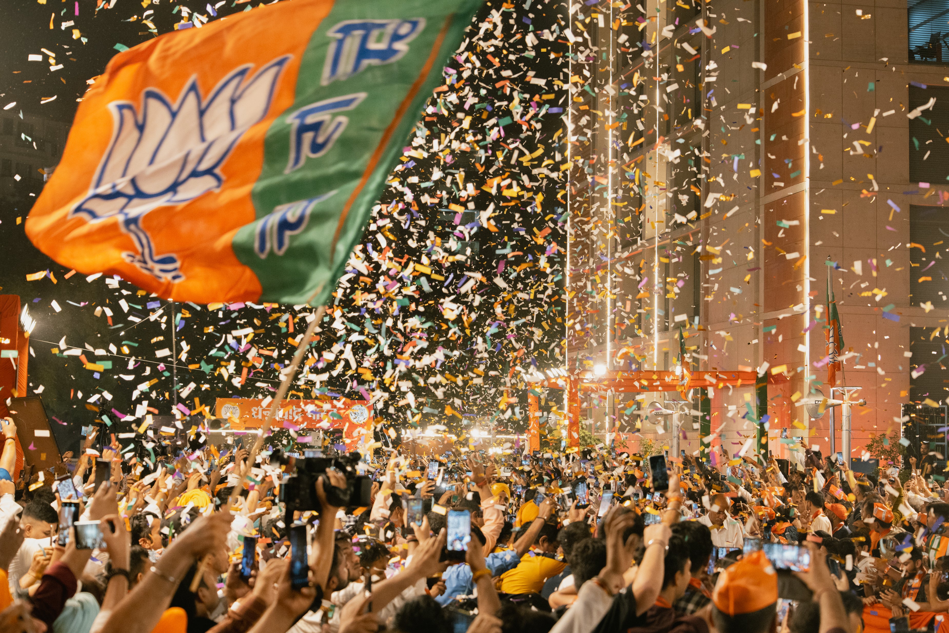 Narendra Modi speaks to his supporters at his party’s headquarters