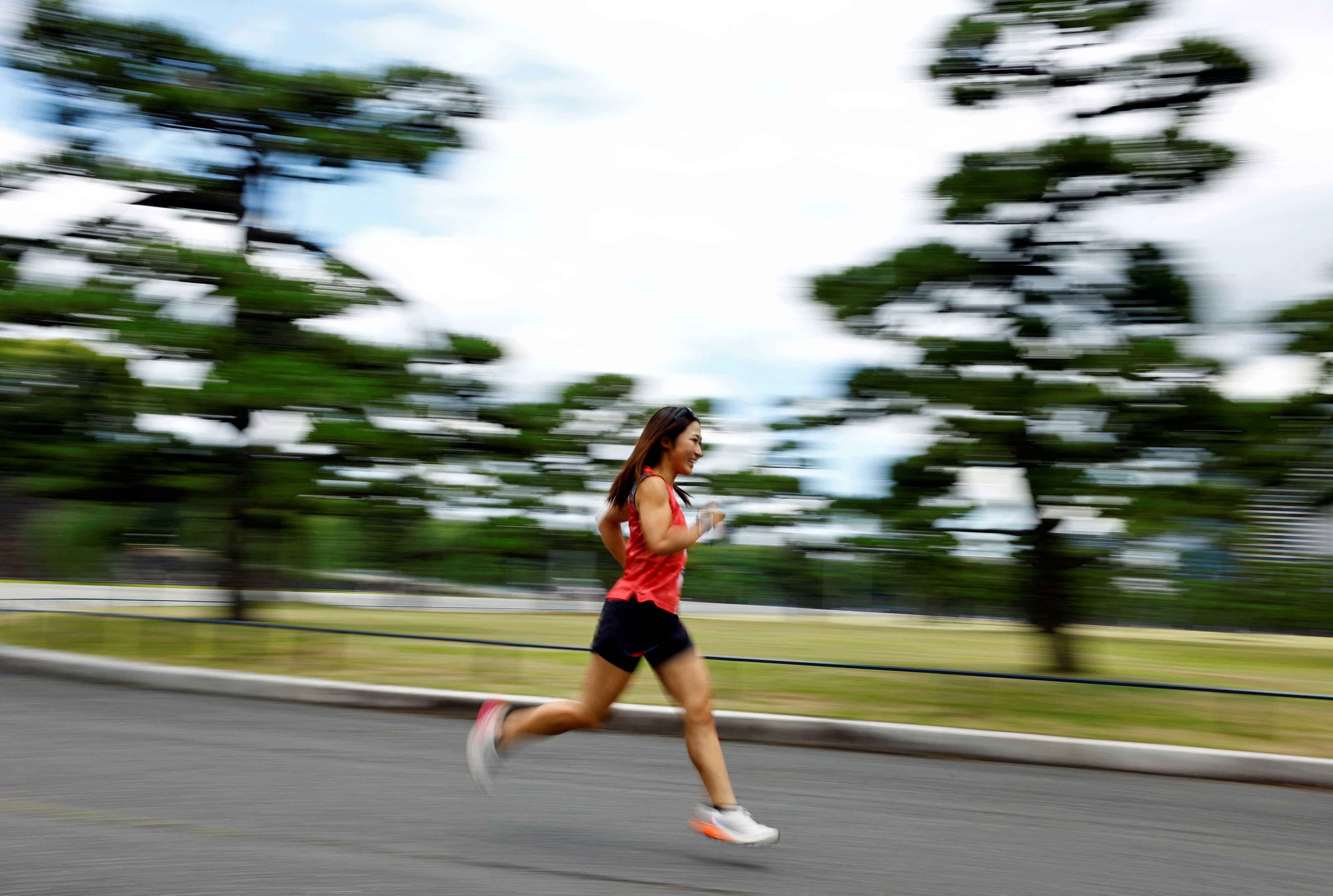 Tomomi Bitoh, 33, Japan's top ultra runner, takes part in a workout session around the Imperial Palace in Tokyo, Japan June 4, 2024