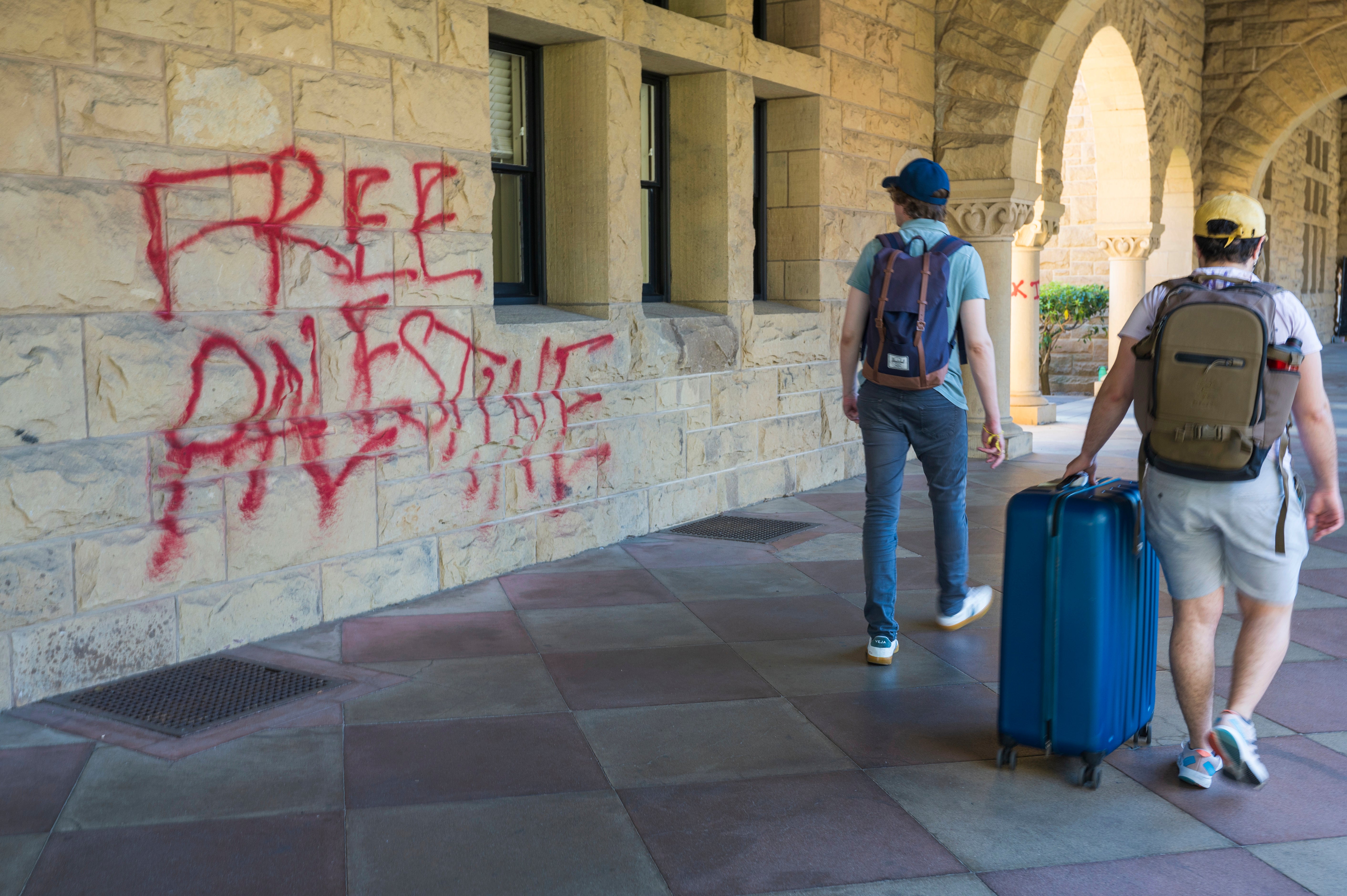 Stanford University said 13 people were arrested as law enforcement removed pro-Palestinian demonstrators who occupied a campus building early Wednesday that houses the university president and provost offices