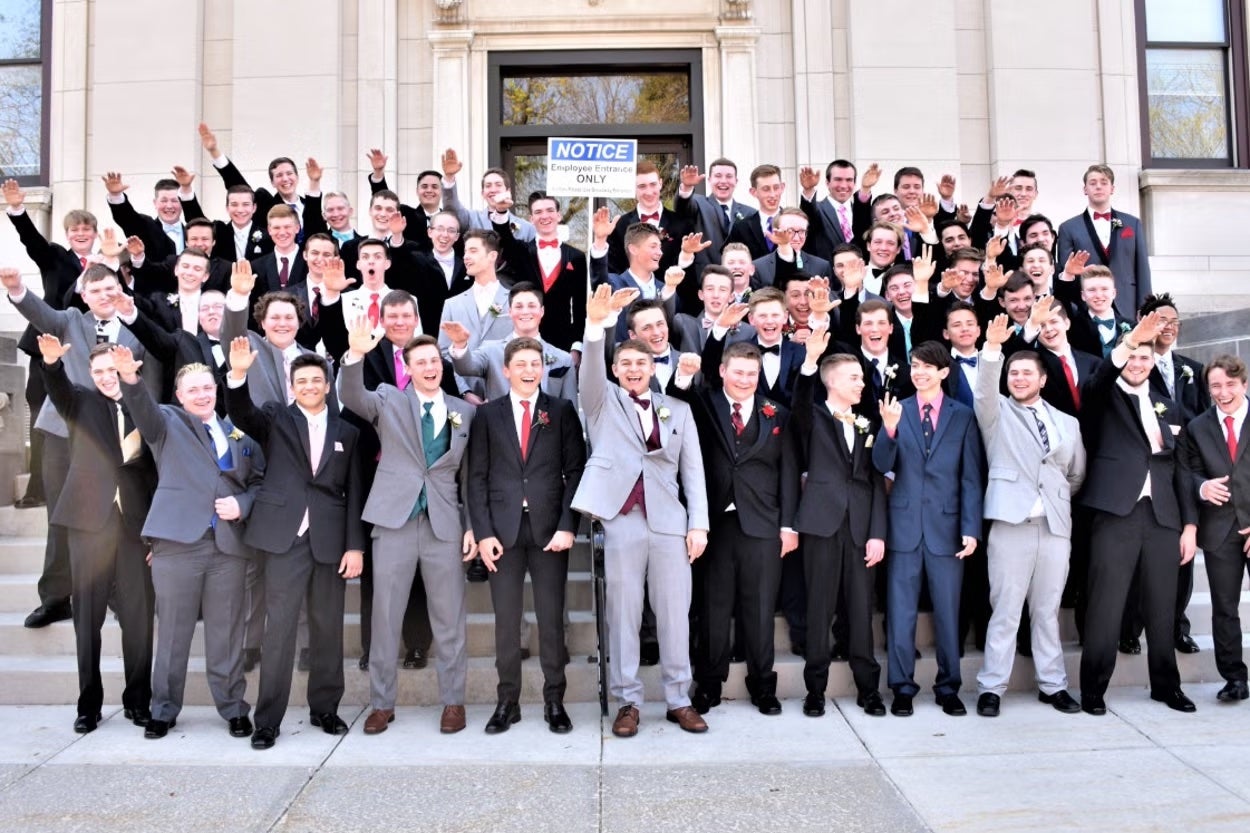 A group of current and former Baraboo High School students pictured performing the Nazi salute