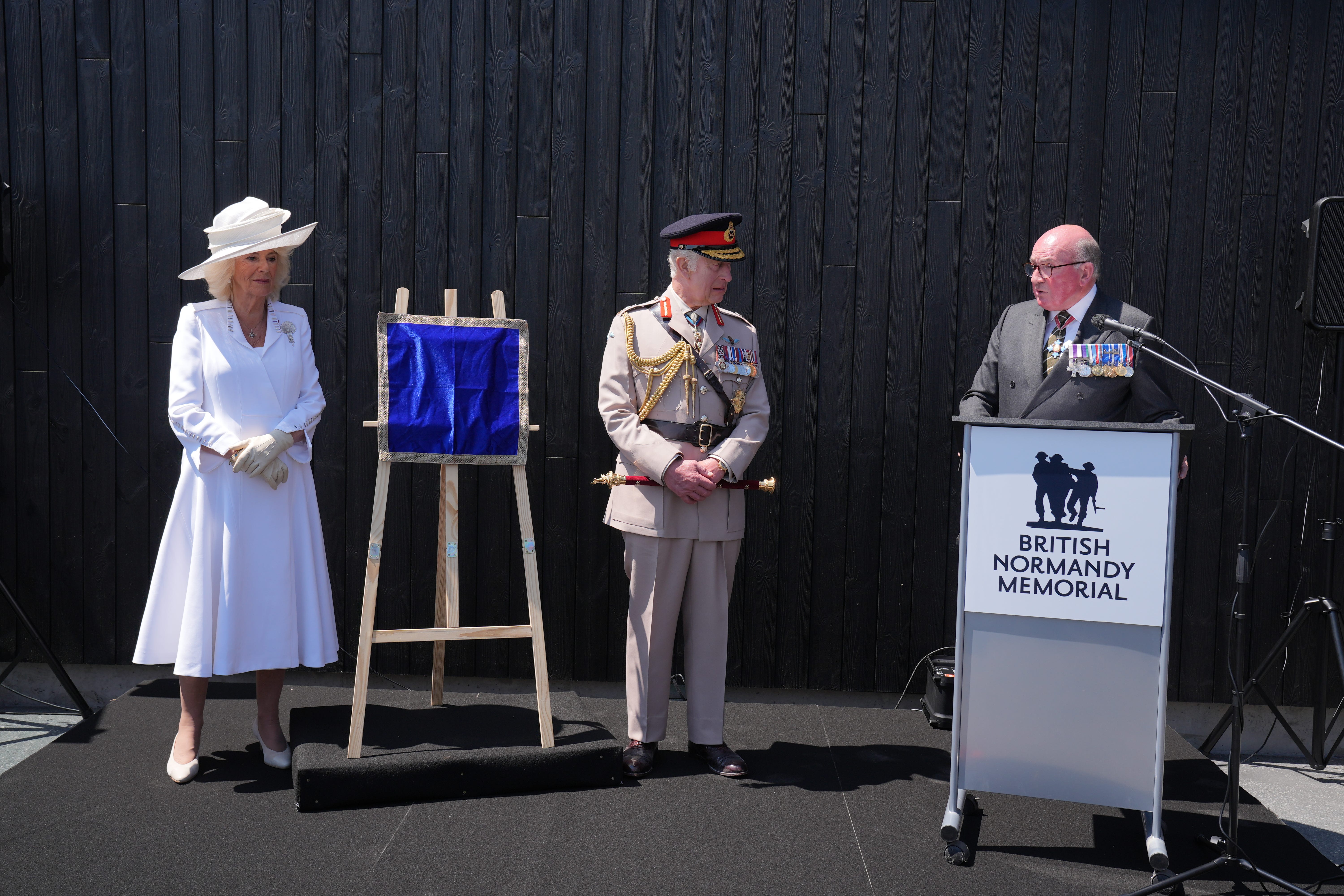 The King and Queen listen to General Lord Dannatt (Gareth Fuller/PA)