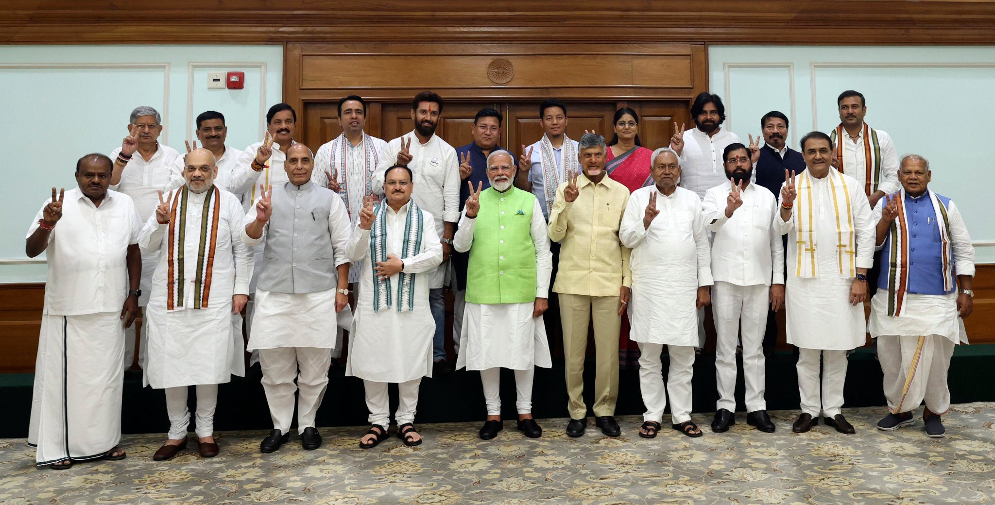 Narendra Modi, center, poses for a photograph with senior leaders of the Bharatiya Janata Party (BJP) and to his left, Telugu Desam Party leader N Chandrababu Naidu, and Janata Dal (United) leader Nitish Kumar, during a meeting at his residence in New Delhi, India, Wednesday, 5 June 2024