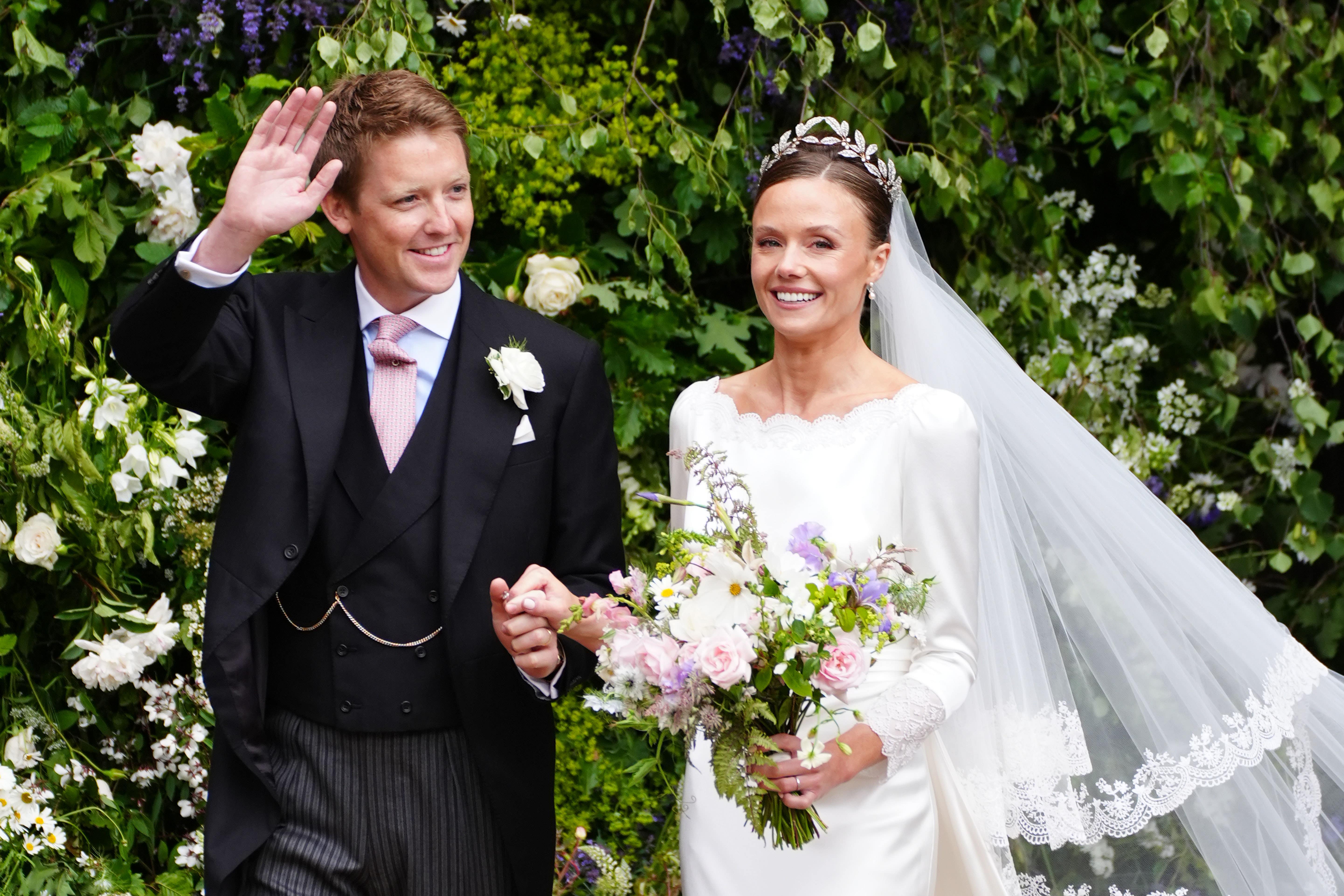 Olivia Henson and Hugh Grosvenor, the Duke of Westminster leave Chester Cathedral after their wedding ceremony (Peter Byrne/PA)