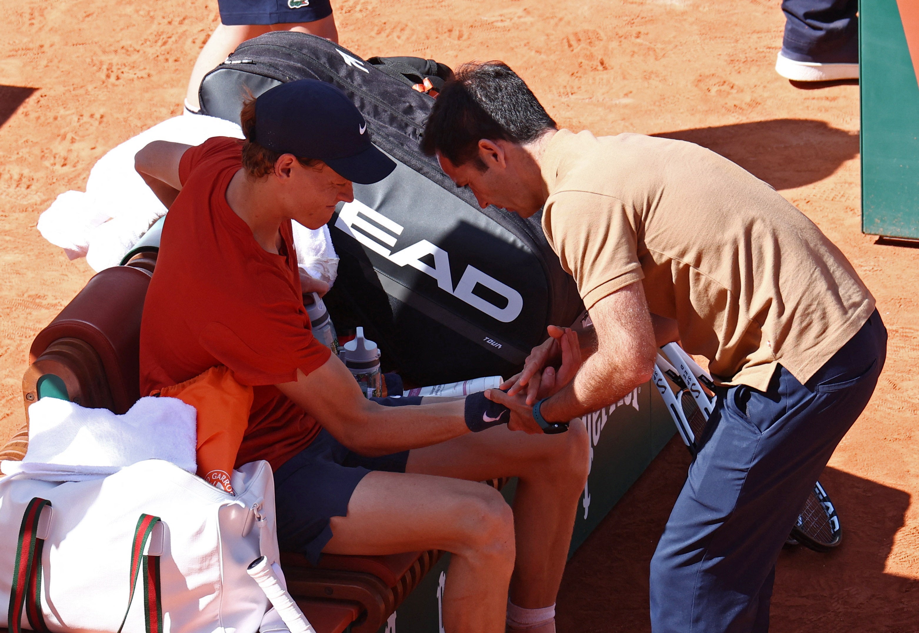 Sinner receives treatment during the third set