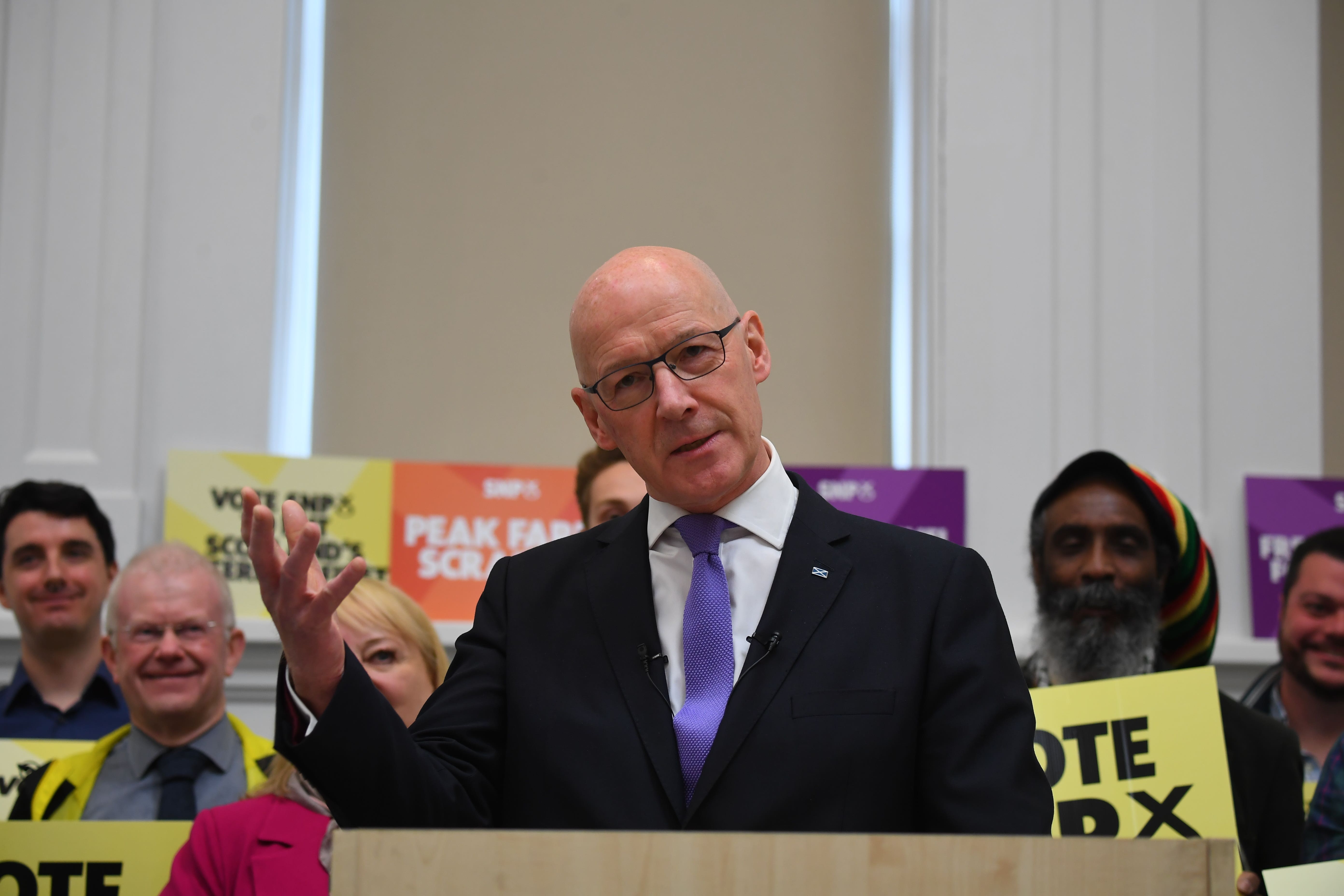 First Minister John Swinney delivers a speech in Glasgow (Andy Buchanan/PA)