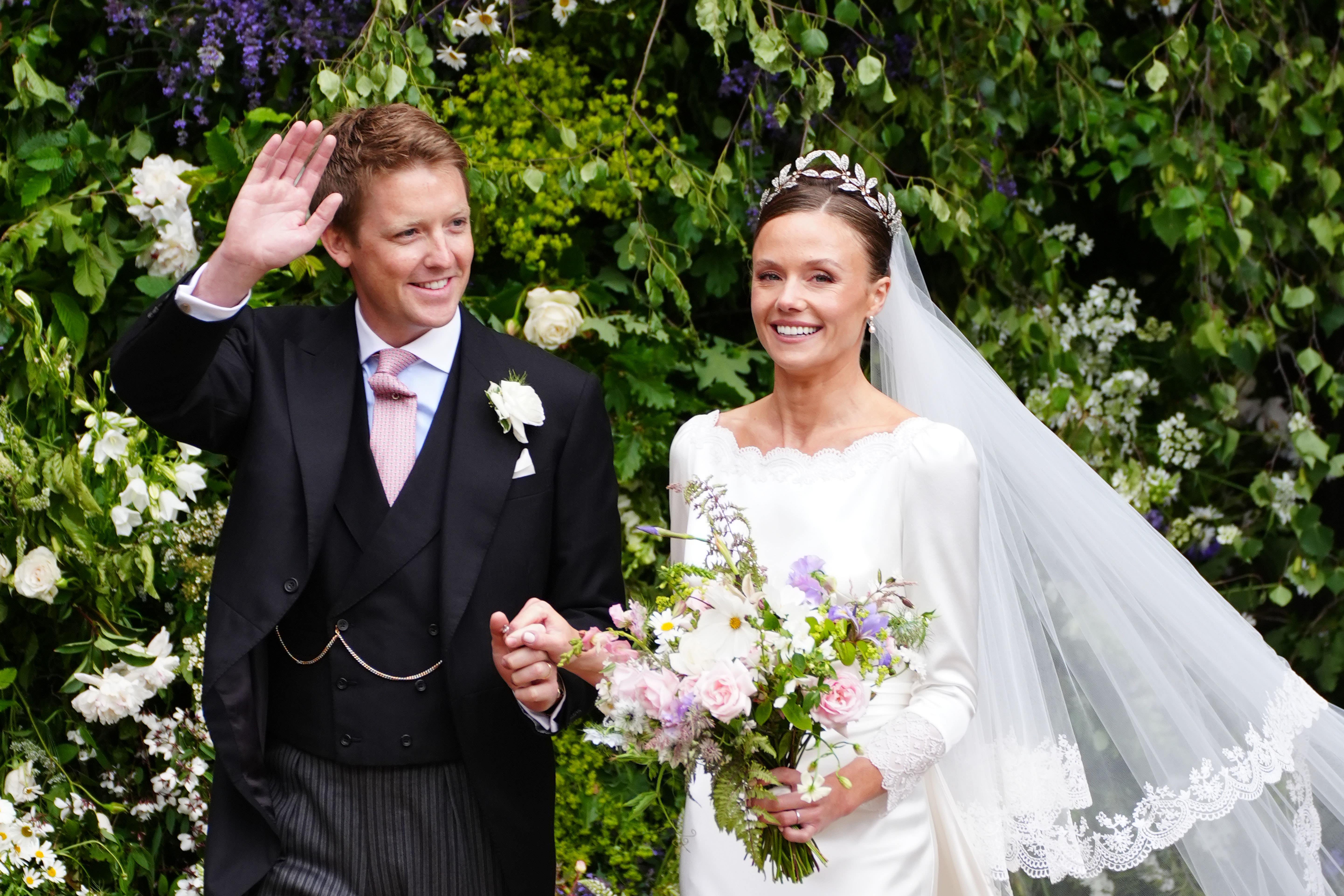 Olivia Henson and Hugh Grosvenor, the Duke of Westminster leave Chester Cathedral after their wedding (Peter Byrne/PA)