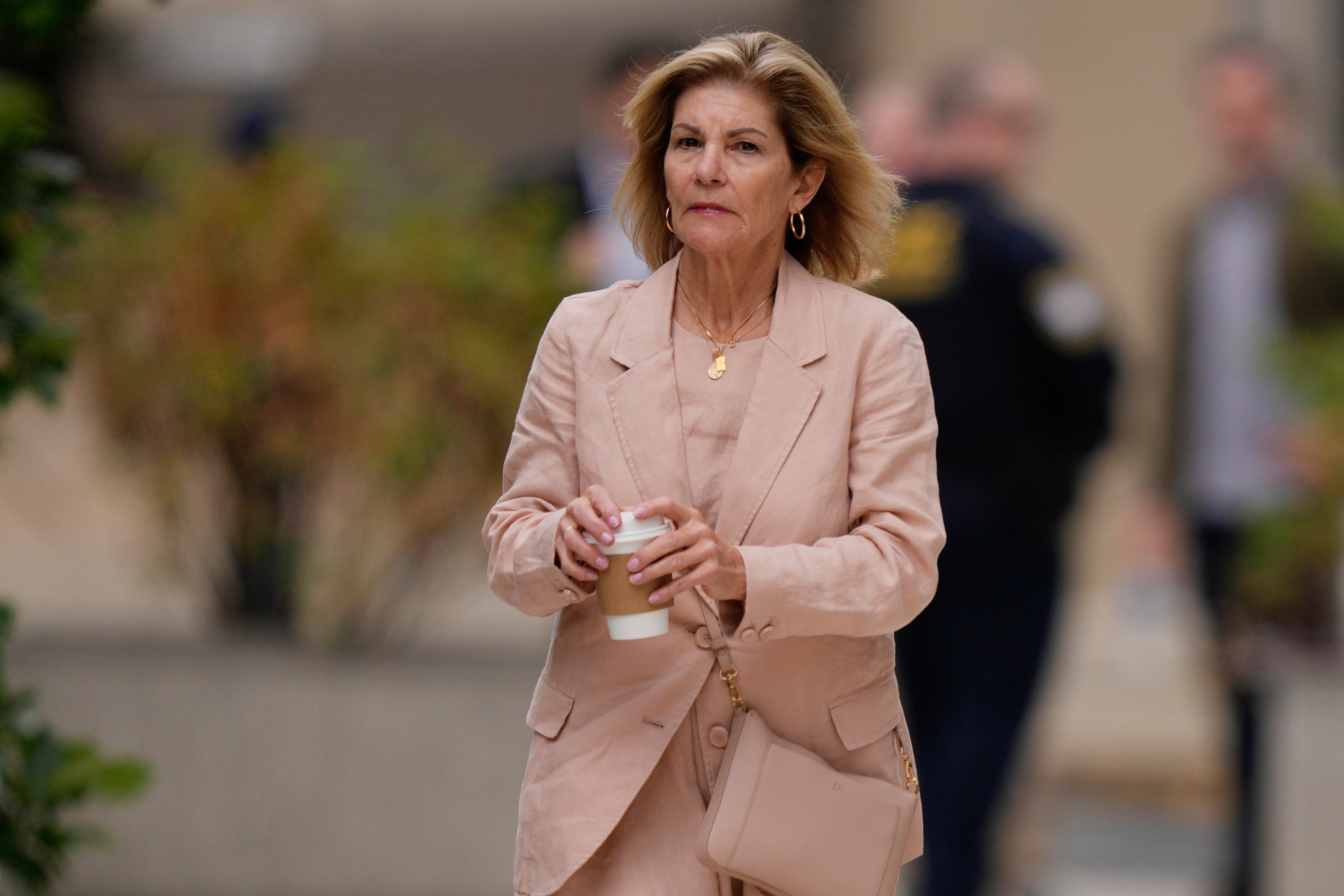 Bonny Jacobs was seen sitting next to her sister, the first lady, during the trial