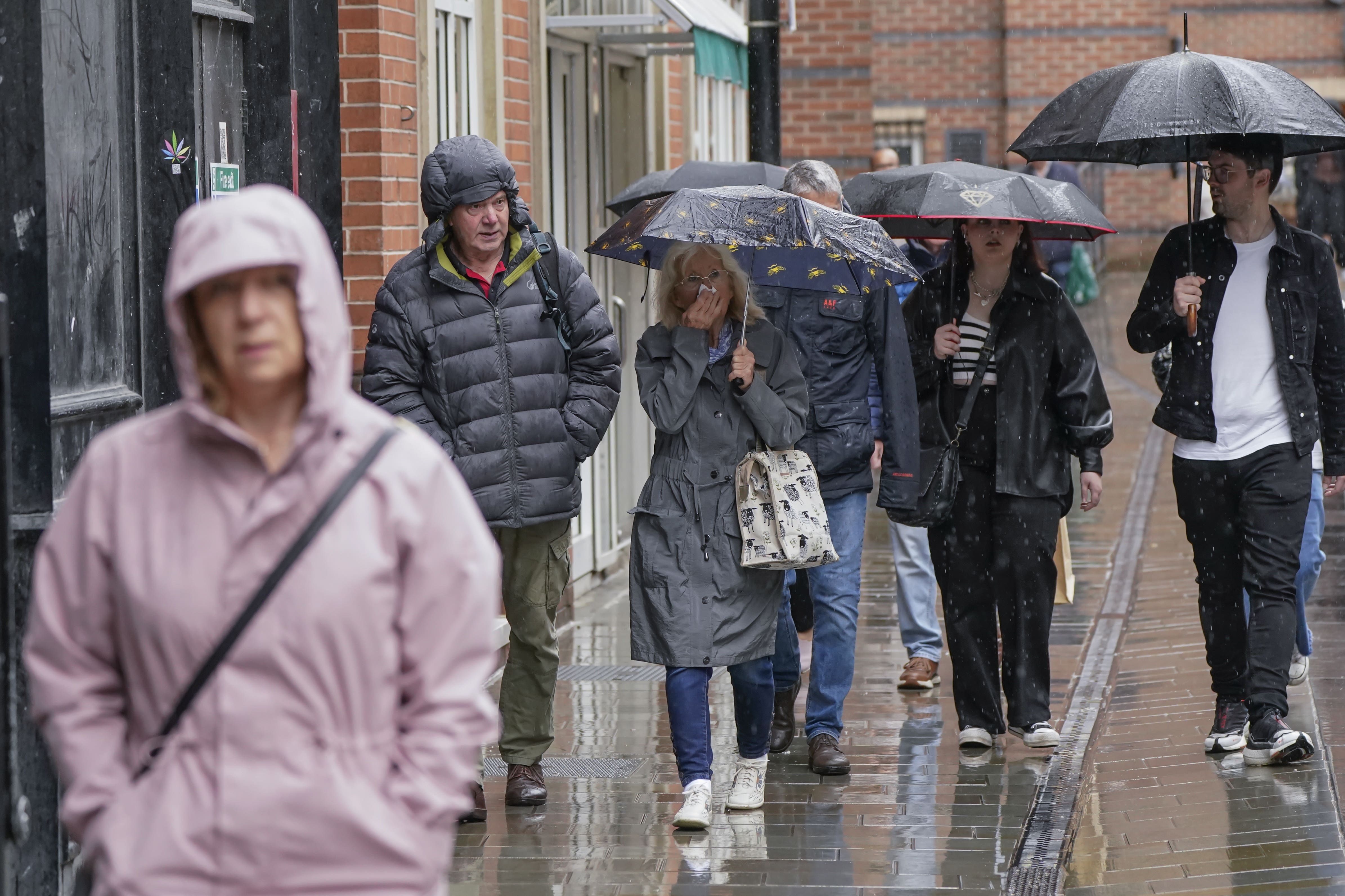 Heavy rain could bring flooding and travel disruption across much of the UK on Wednesday and Thursday with an amber warning issued for part of the country (Danny Lawson/PA)