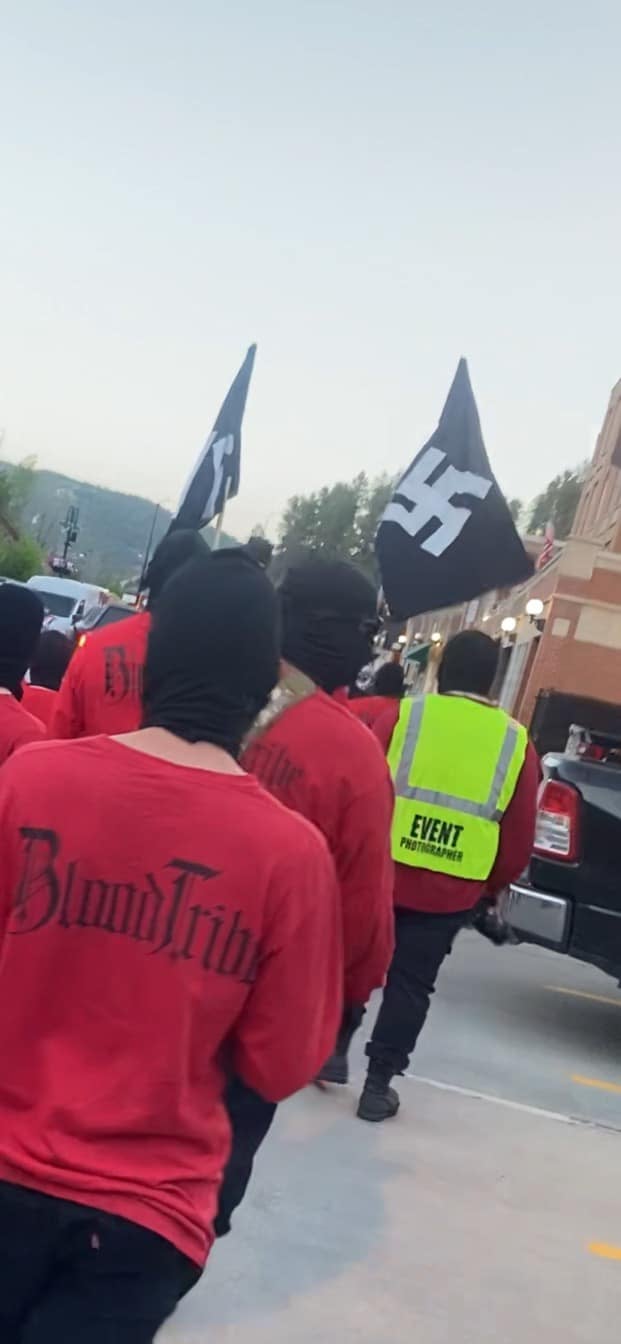 A neo-Nazi group displayed a Nazi flag on the steps of South Dakota’s state capitol as they held rallies in the state.