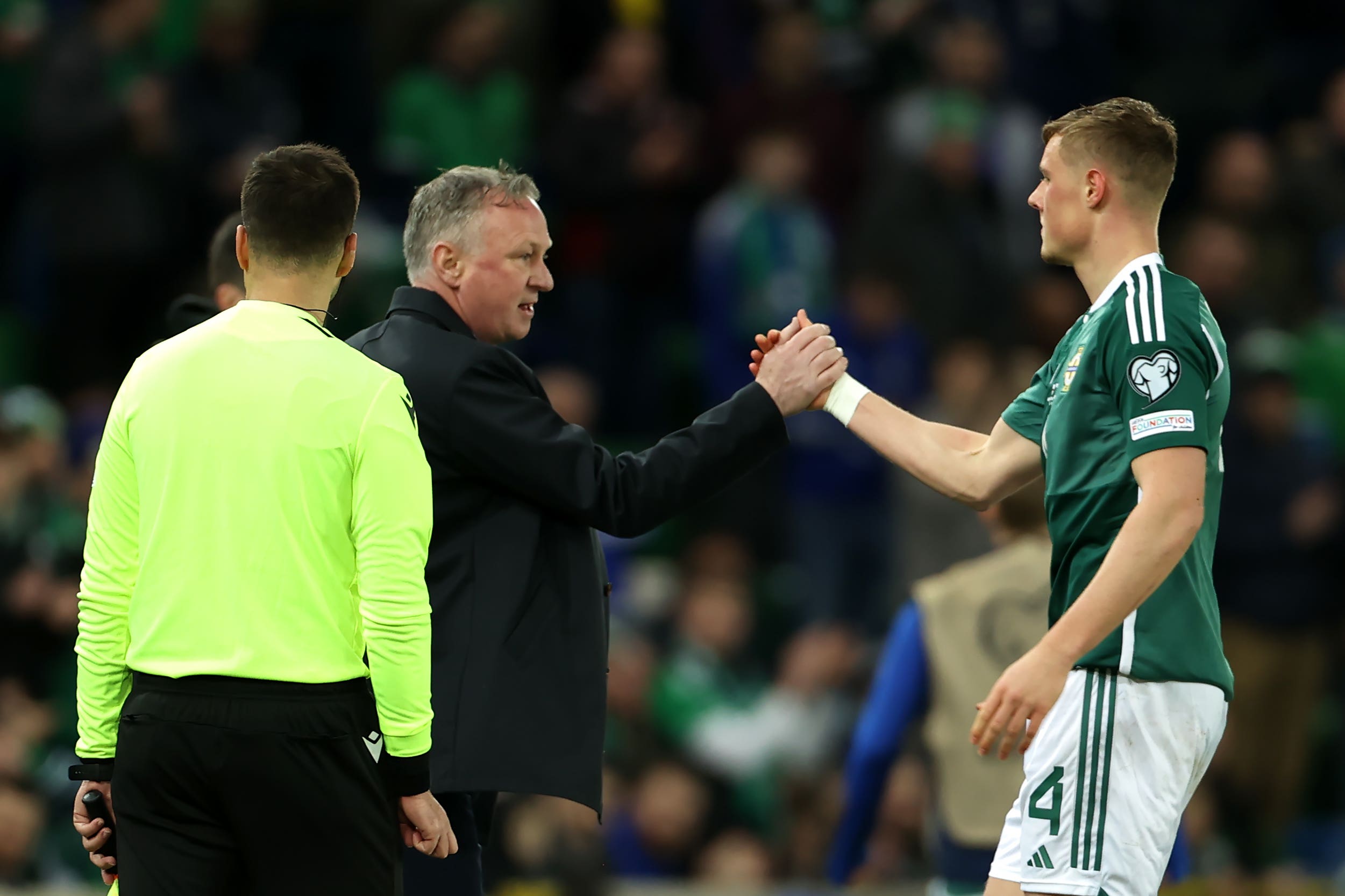 Daniel Ballard, right, is set to captain Northern Ireland on Tuesday (Liam McBurney/PA)