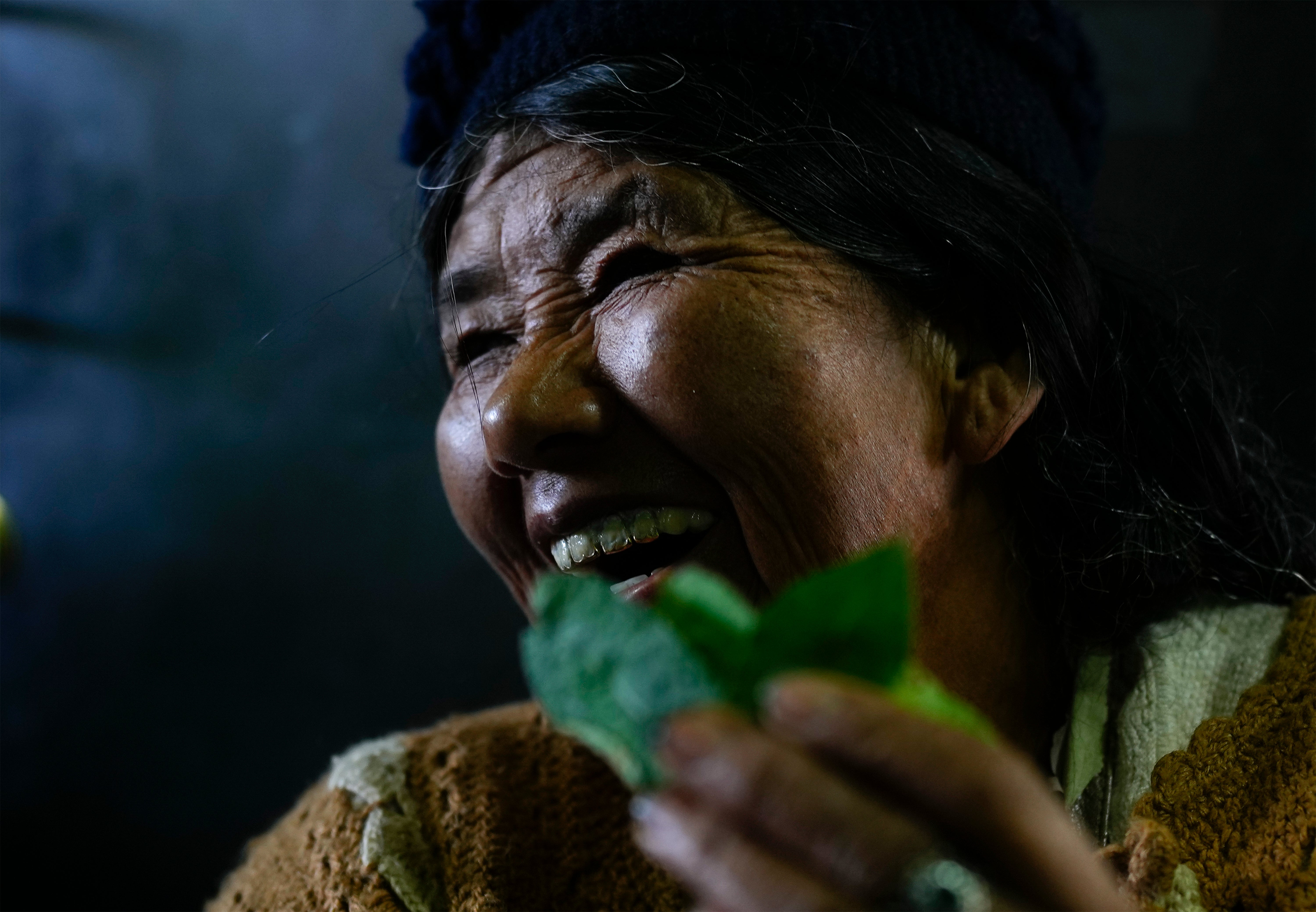 A coca vendor works at a legal coca leaf market in La Paz, Bolivia, Thursday, April 18, 2024