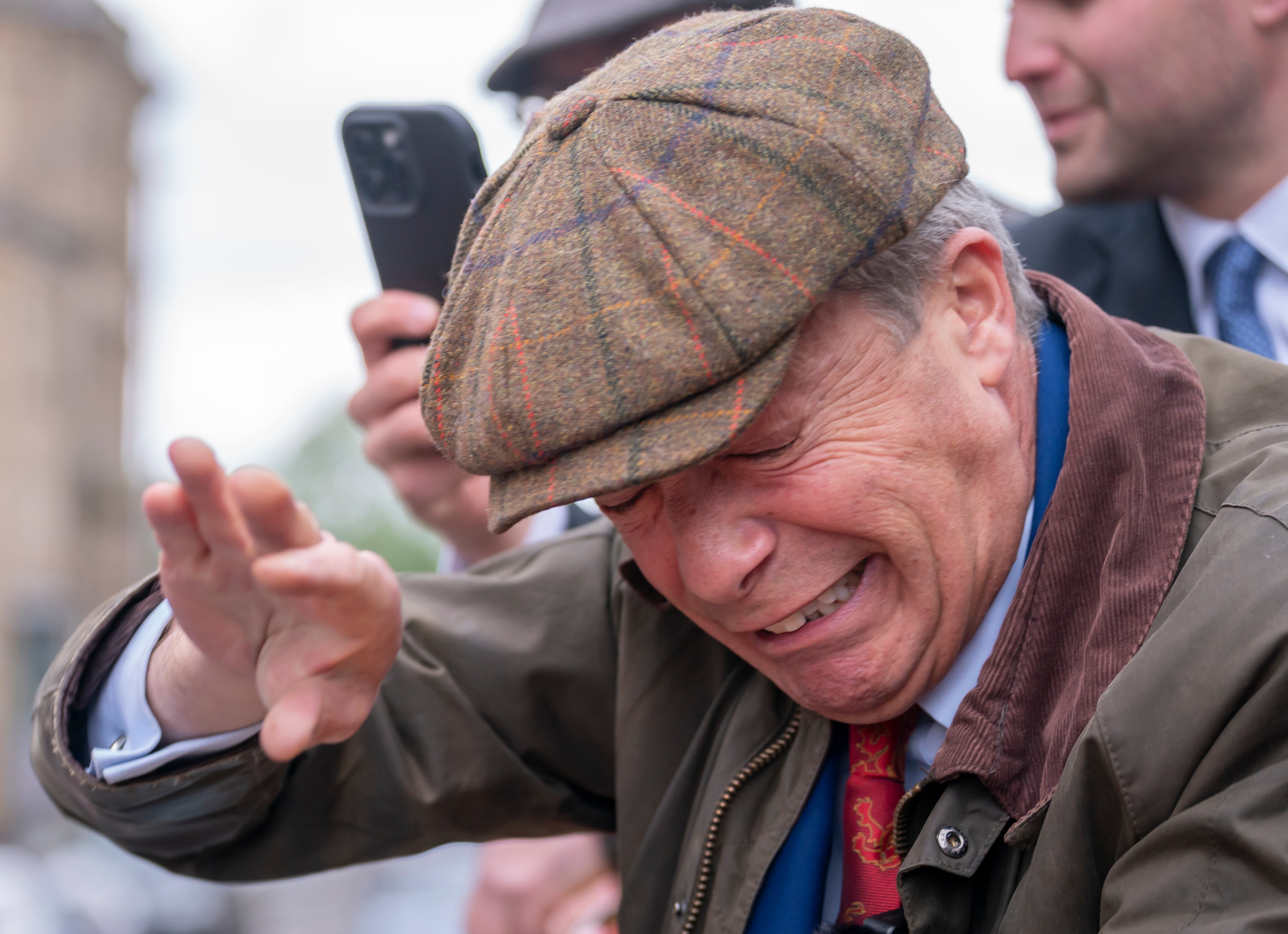 Nigel Farage was on his campaign bus when the objects were thrown towards him