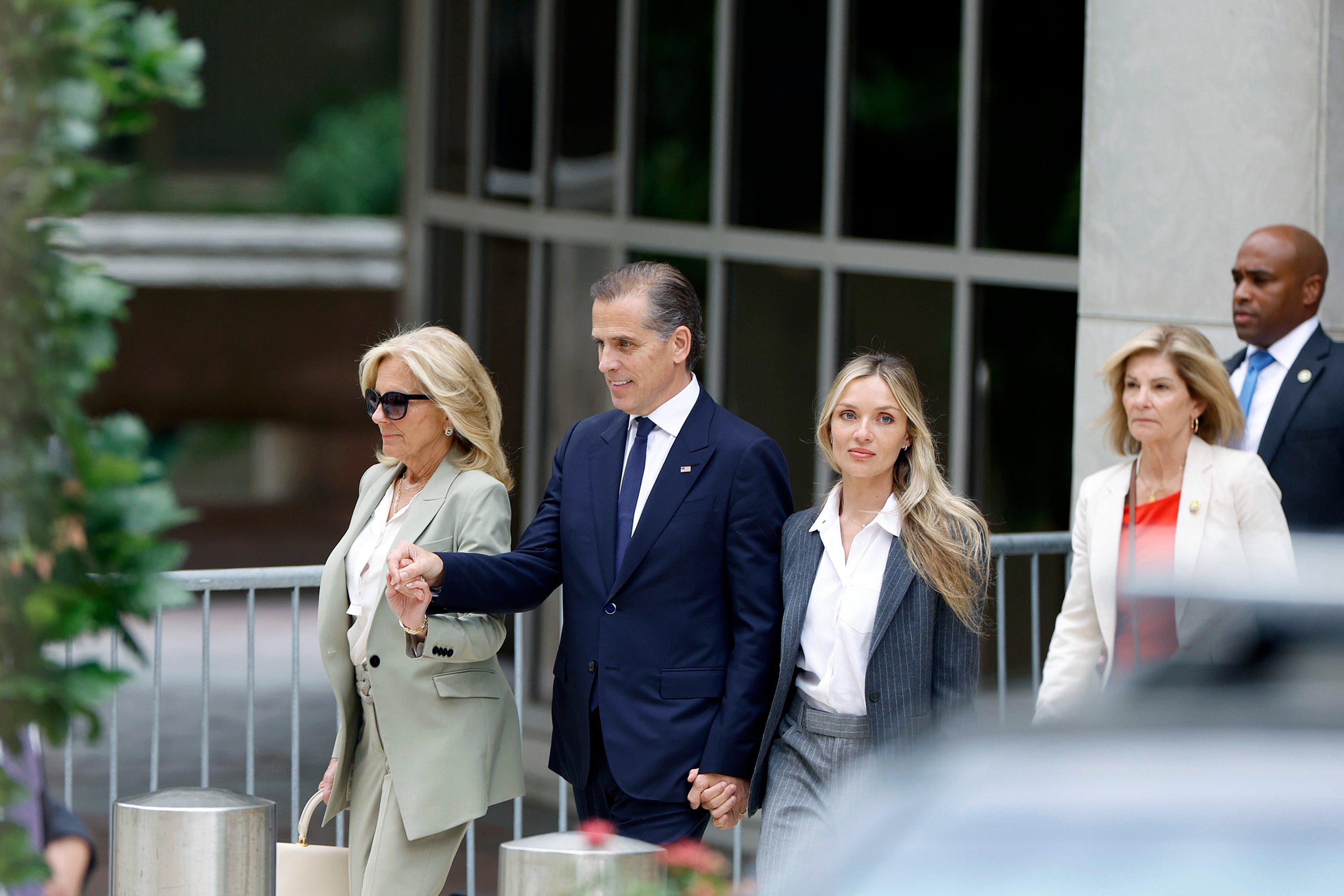 First lady Jill Biden, Hunter Biden, son of U.S. President Joe Biden, joined by his wife Melissa Cohen Biden, leave the J. Caleb Boggs Federal Building on June 11, 2024 in Wilmington, Delaware