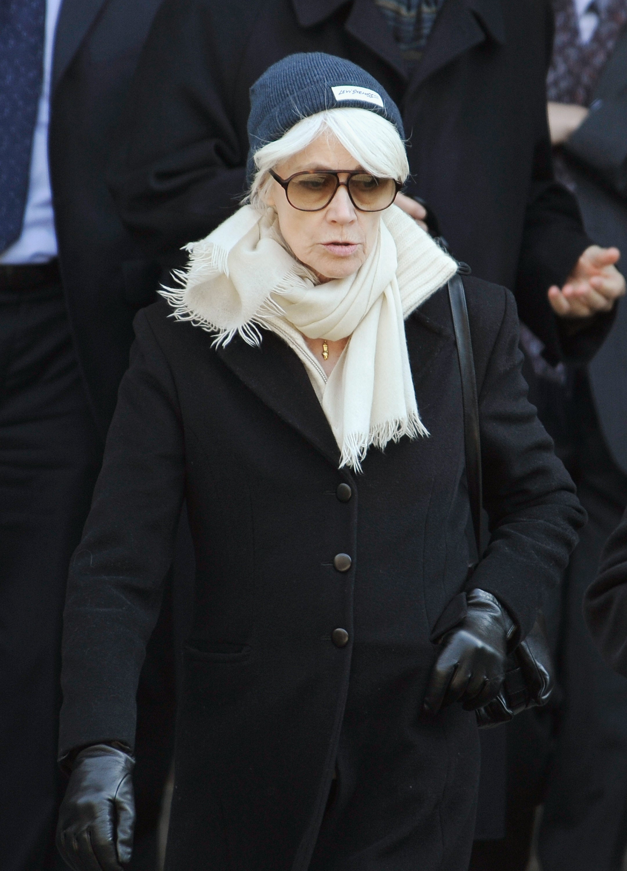 French singer Francoise Hardy leaves the Saint-Germain-des-Pres church after a funeral mass for French singer and composer Alain Bashung at the Saint-Germain-des-Pres church on 20 March, 2009 in Paris, France