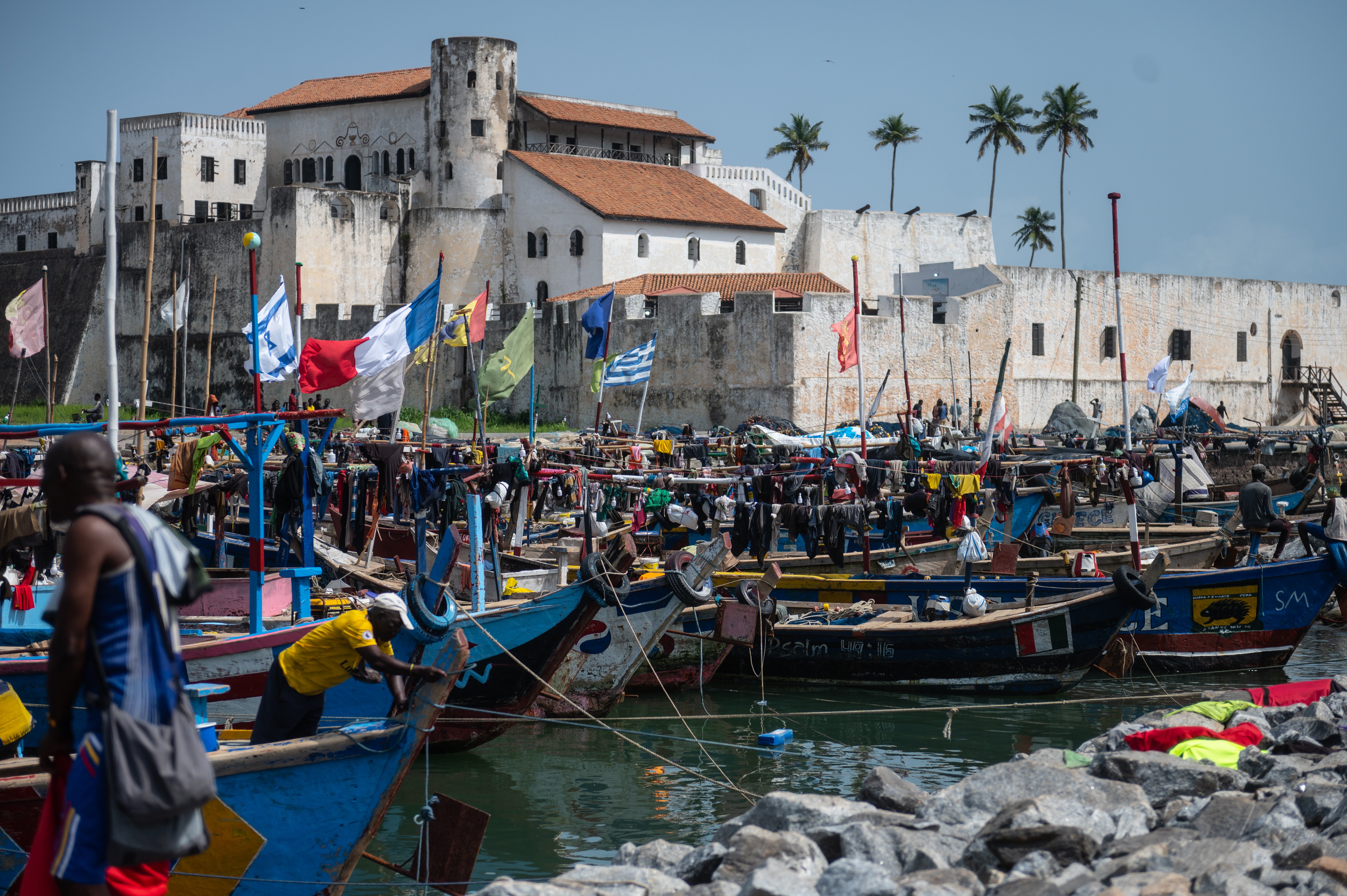 Boats bobbing in the water around Elmina in Ghana