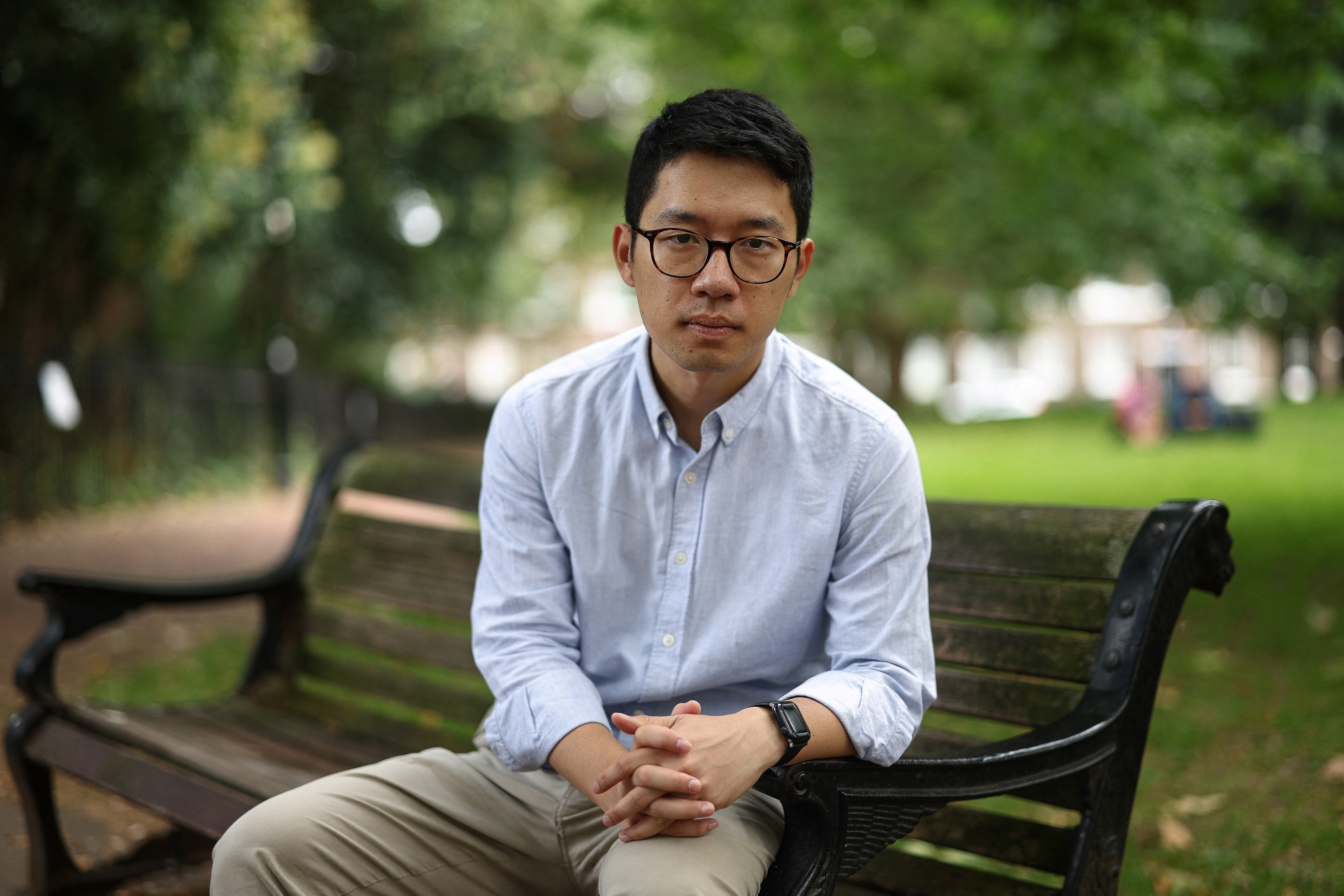 In this picture taken on 18 August 2023, former Hong Kong legislator and pro-democracy activist Nathan Law poses for a photograph in London