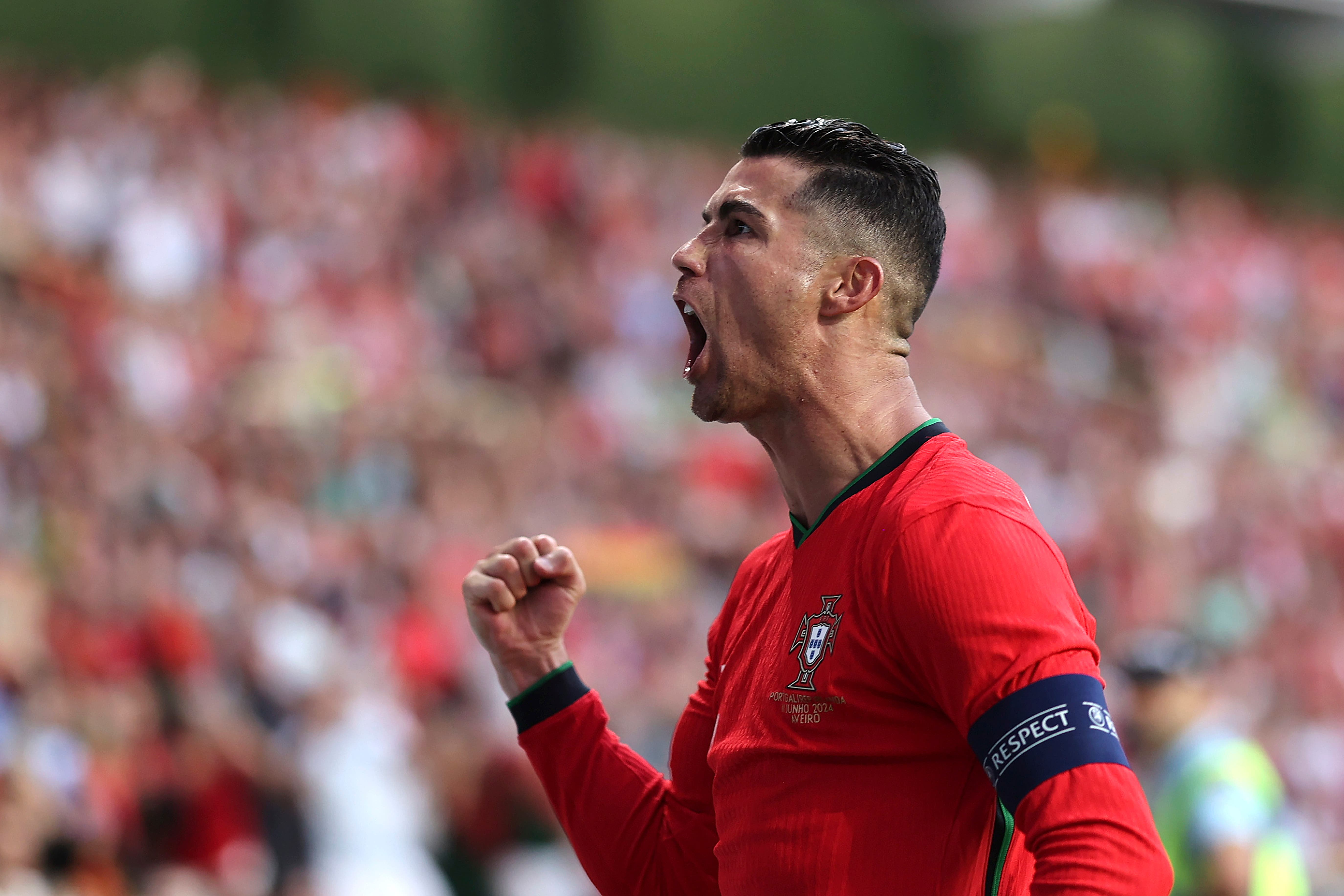 Portugal skipper Cristiano Ronaldo celebrates after scoring against the Republic of Ireland in Aveiro (Luis Vieira/AP)