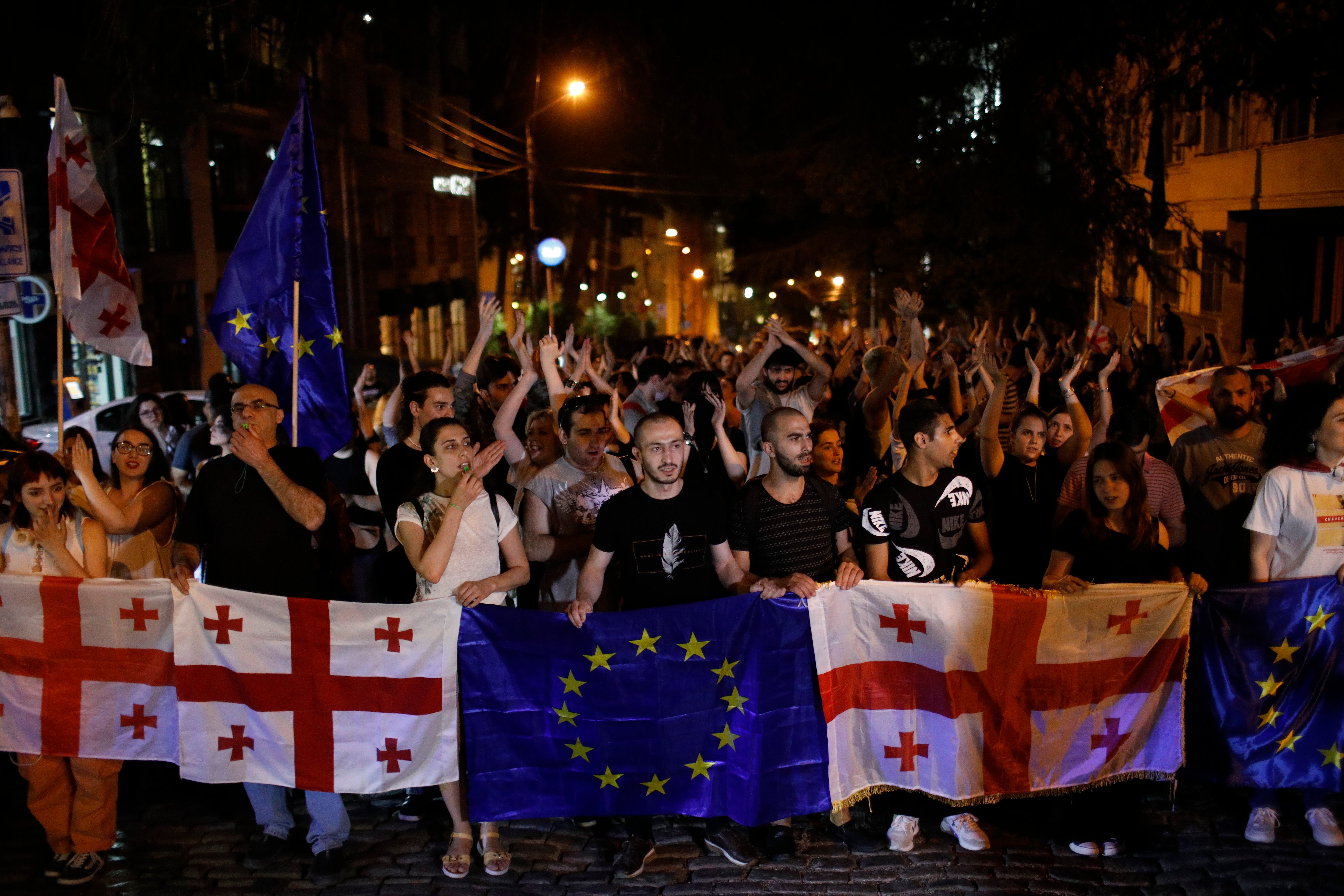 Georgian students protest against a law on ‘foreign agents’ near the Parliament building in Tbilisi, Georgia