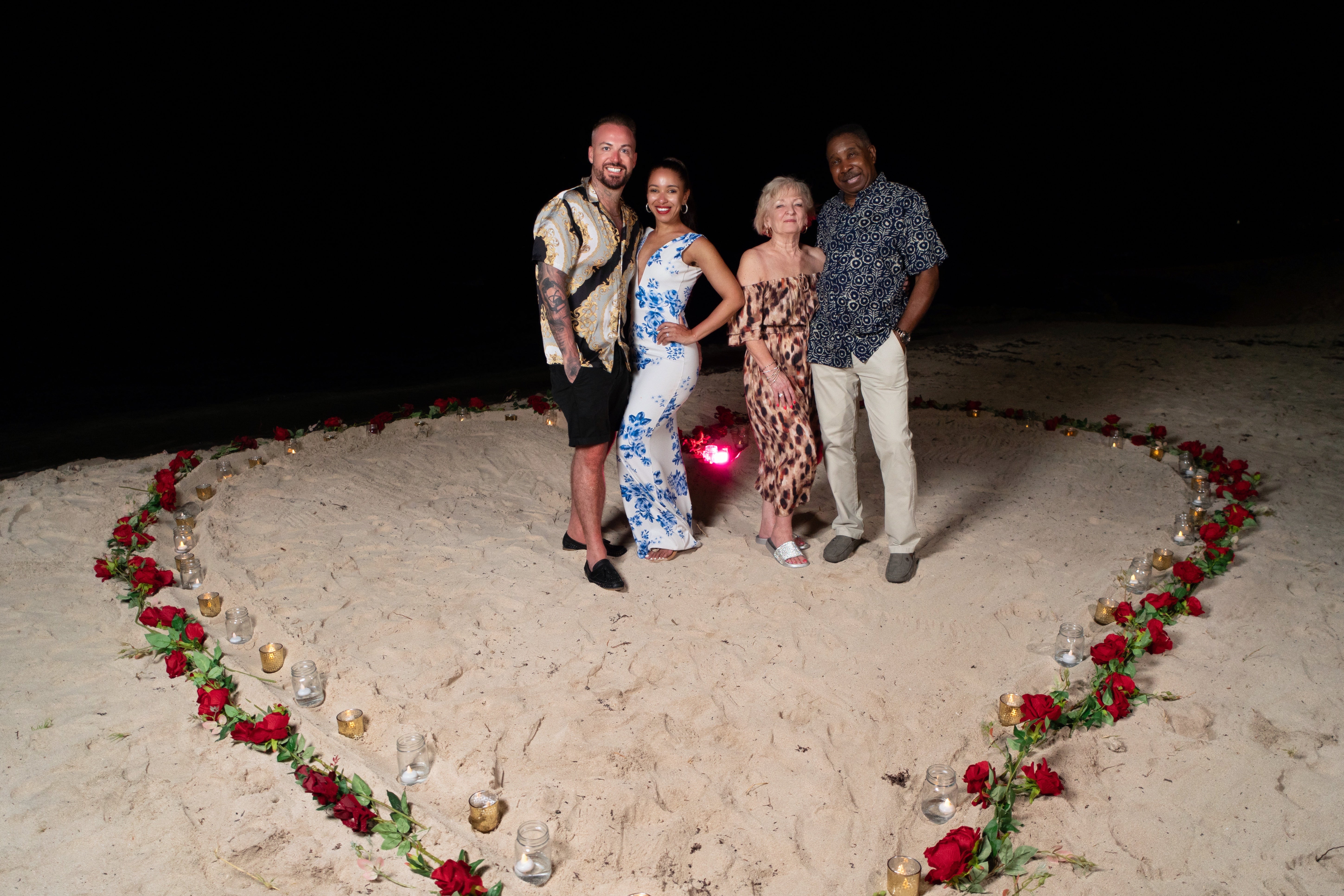 Adam, Victoria and Victoria's parents after the proposal (Ryan Alleyne/PA Real Life)