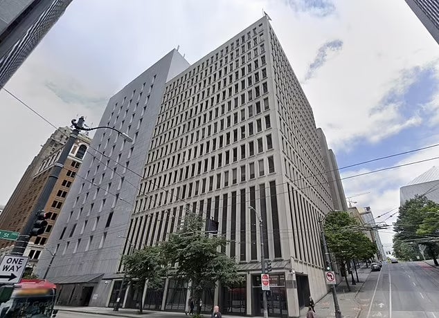 The woman entered the FBI’s office at 1110 Third Avenue in Seattle at 3.14pm on Wednesday