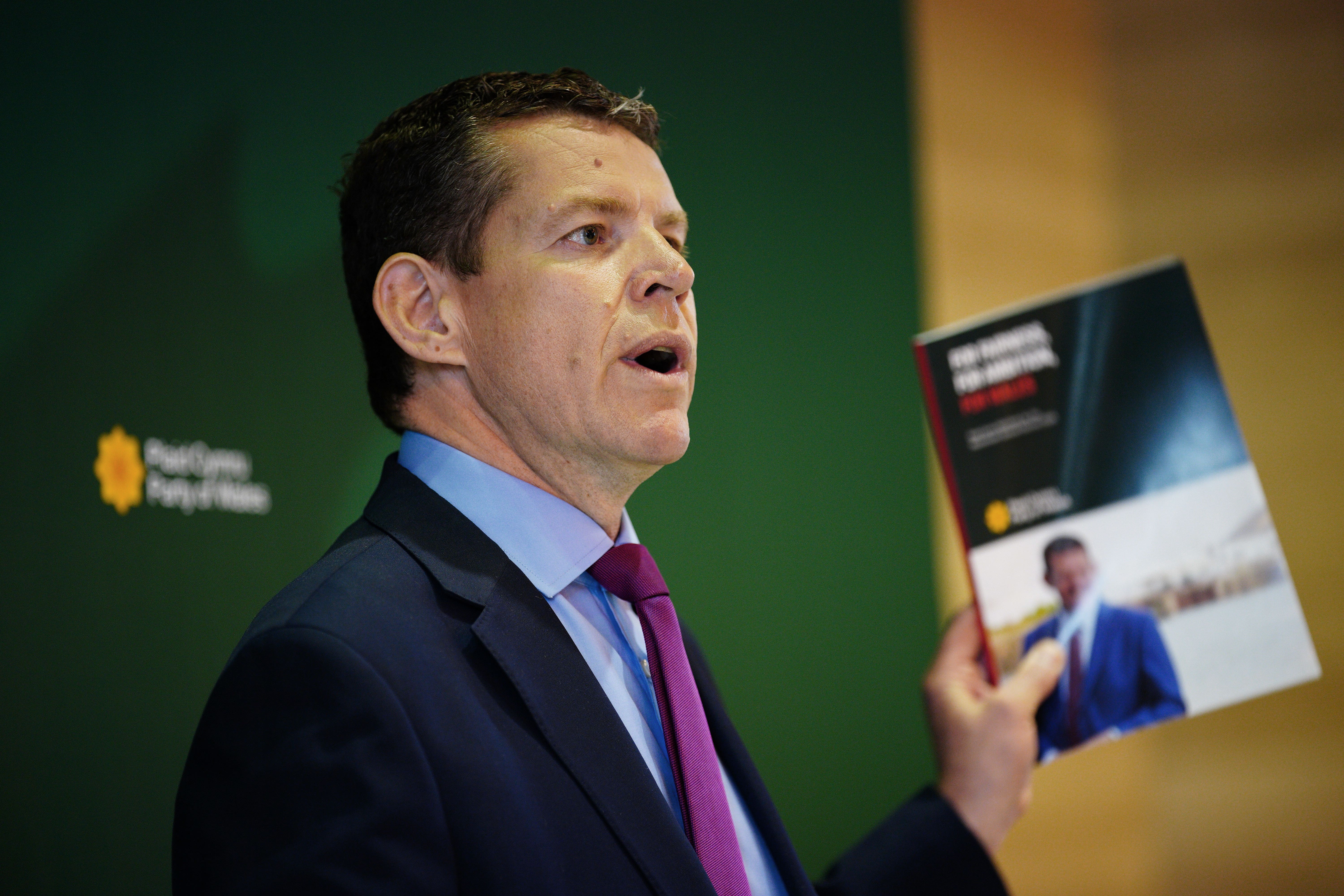 Plaid Cymru leader Rhun ap Iorwerth with his party’s manifesto (Ben Birchall/PA)