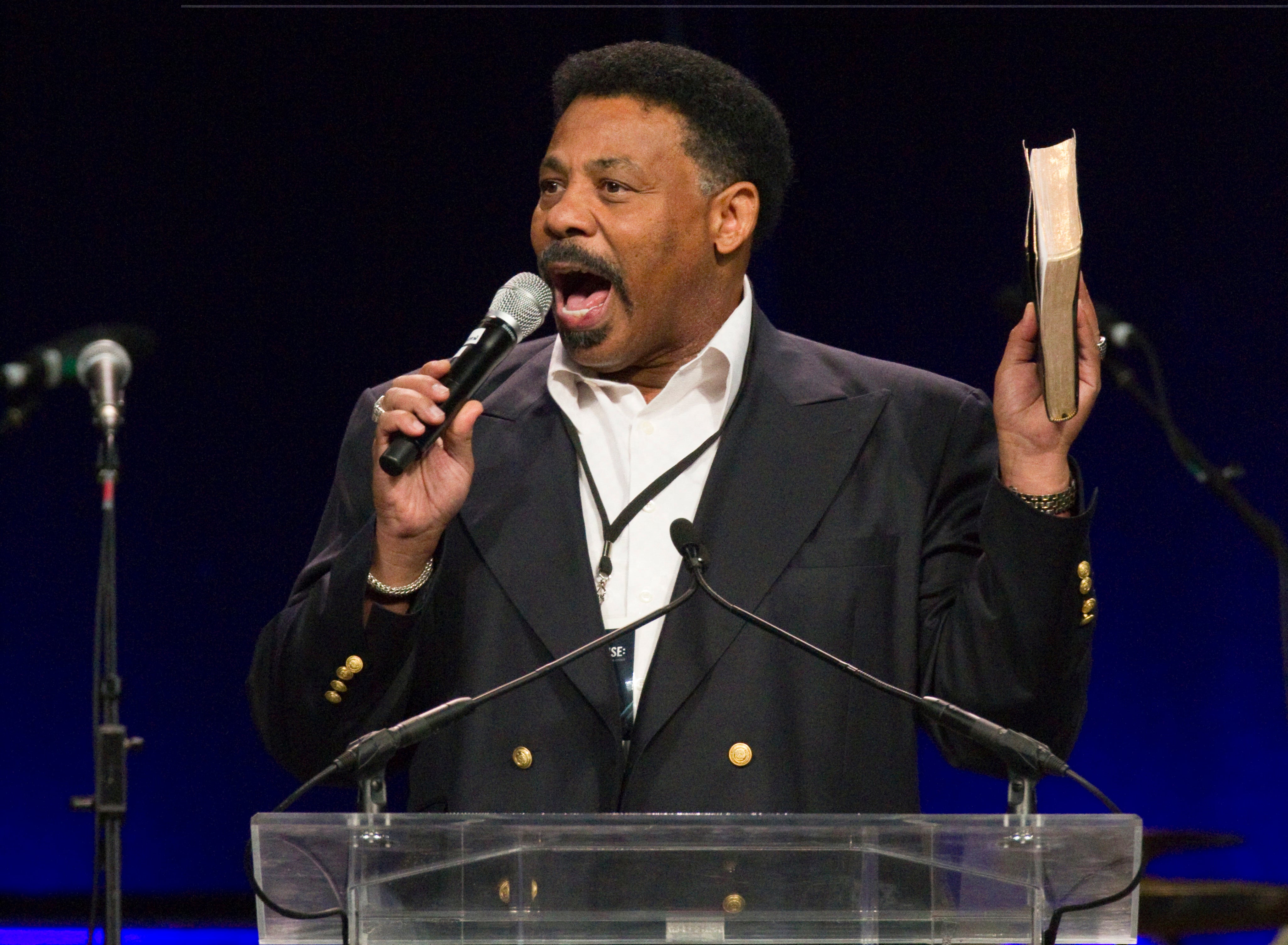 Dr Tony Evans preaching at Reliant Stadium in Houston, Texas. He has resigned from his church after 48 years due to “sin.”