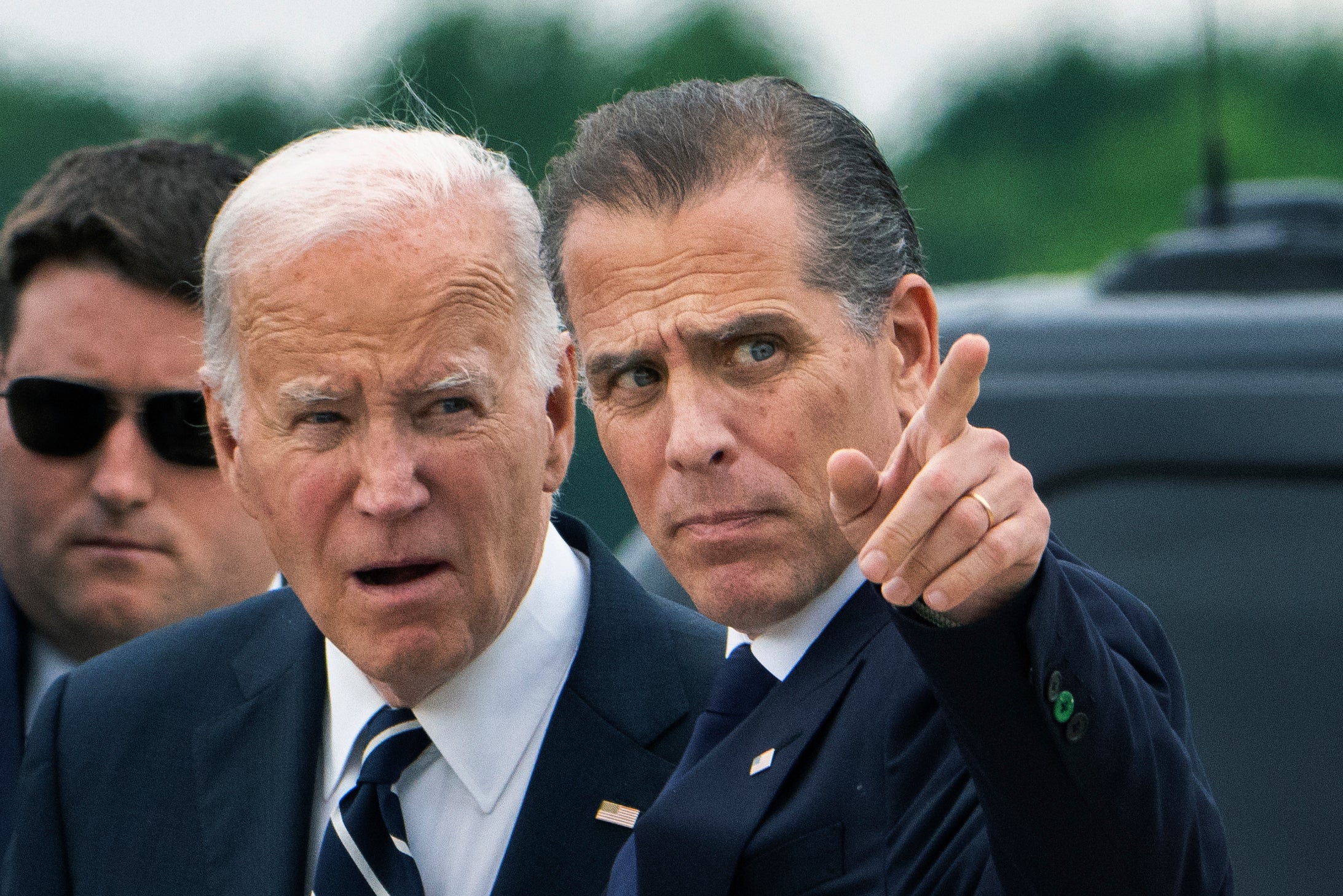 President Joe Biden talks with his son Hunter Biden as he arrives at Delaware Air National Guard Base in New Castle, Deleware Tuesday 11 June 2024