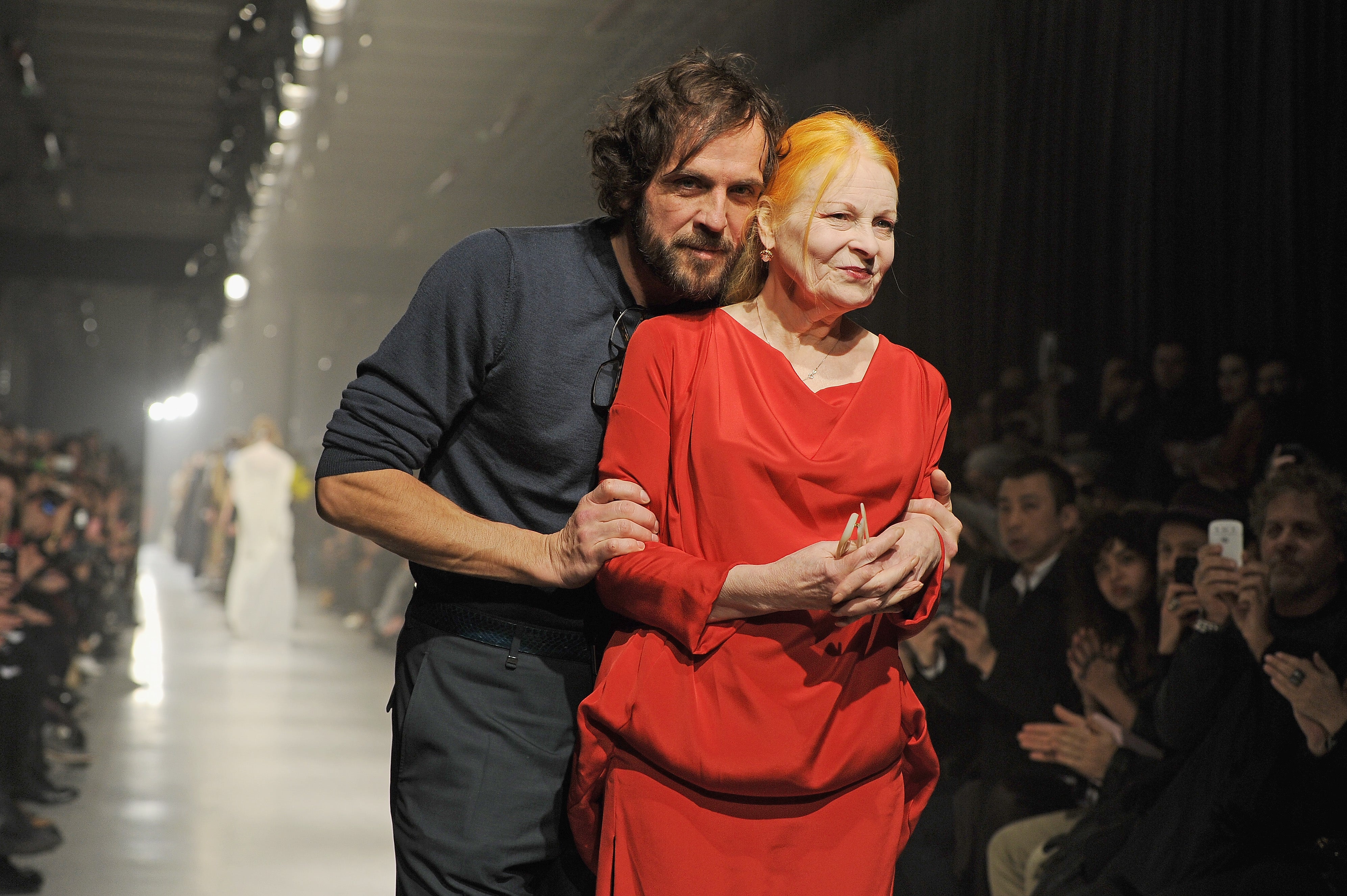 Westwood and her husband Andreas Kronthaler at Paris Fashion Week 2013