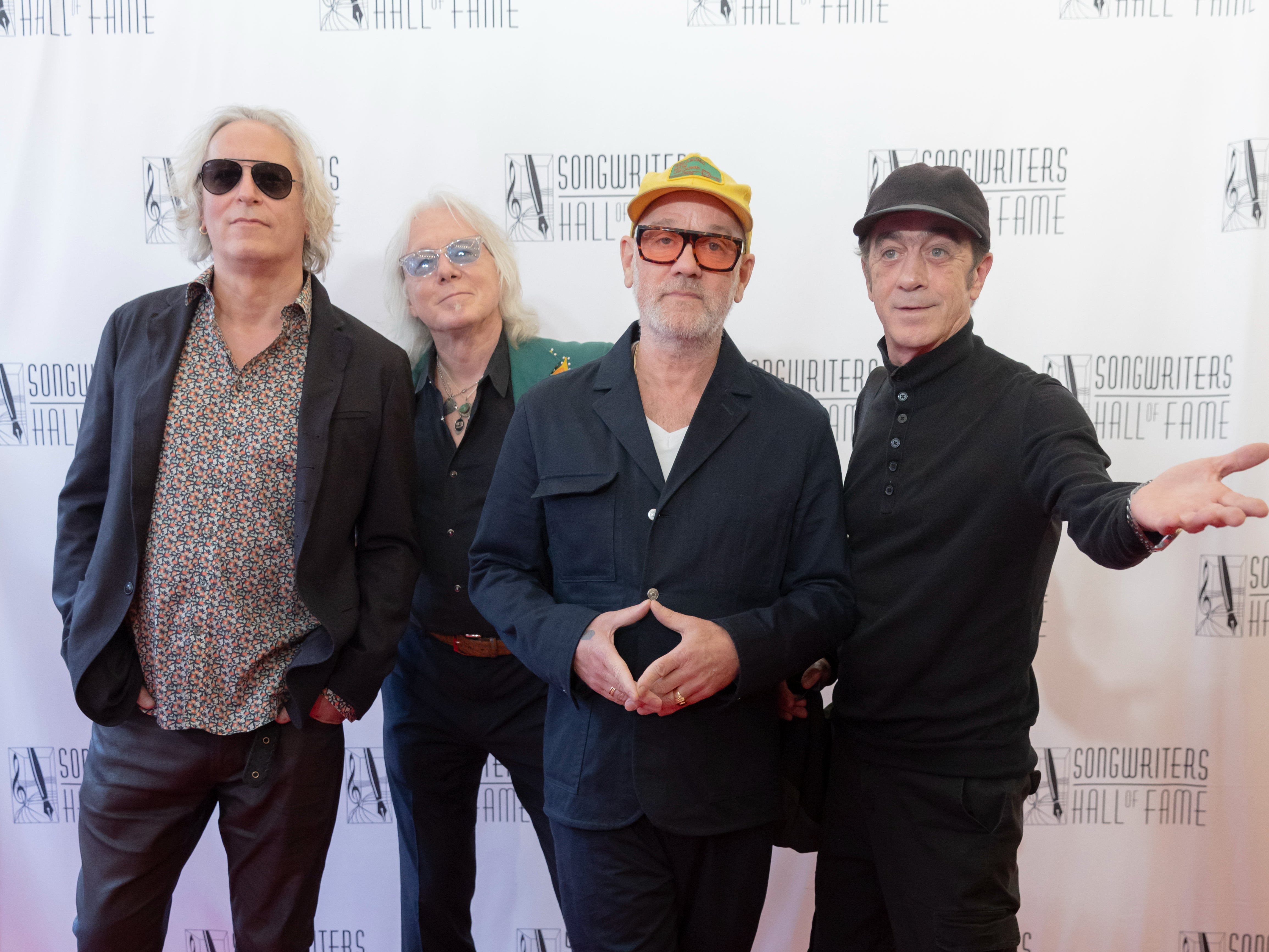 Peter Buck, Mike Mills, Michael Stipe, and Bill Berry of R.E.M. attend the 2024 Songwriters Hall Of Fame Induction