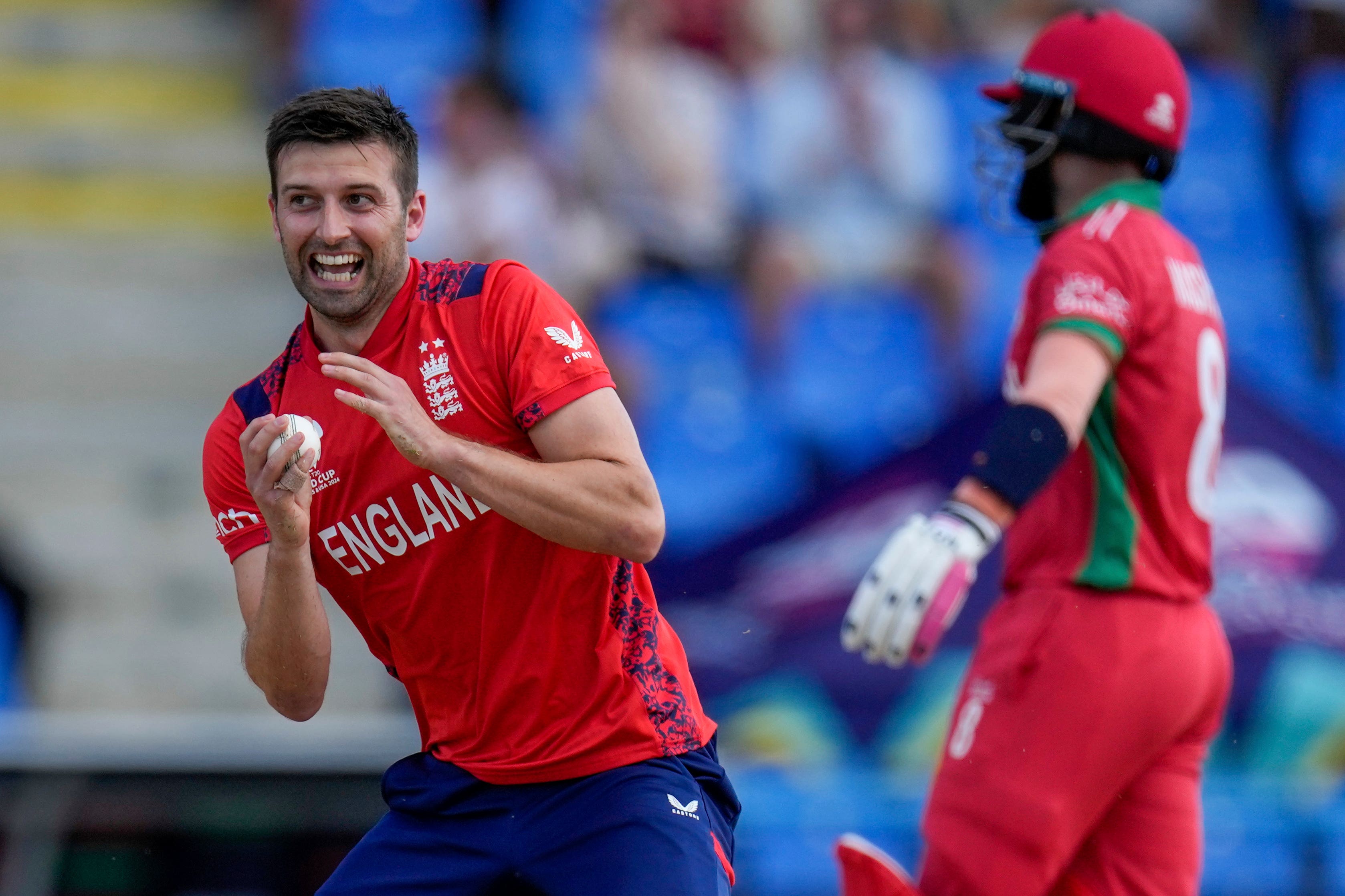 Mark Wood took three wickets against Oman (Ricardo Mazalan/AP)