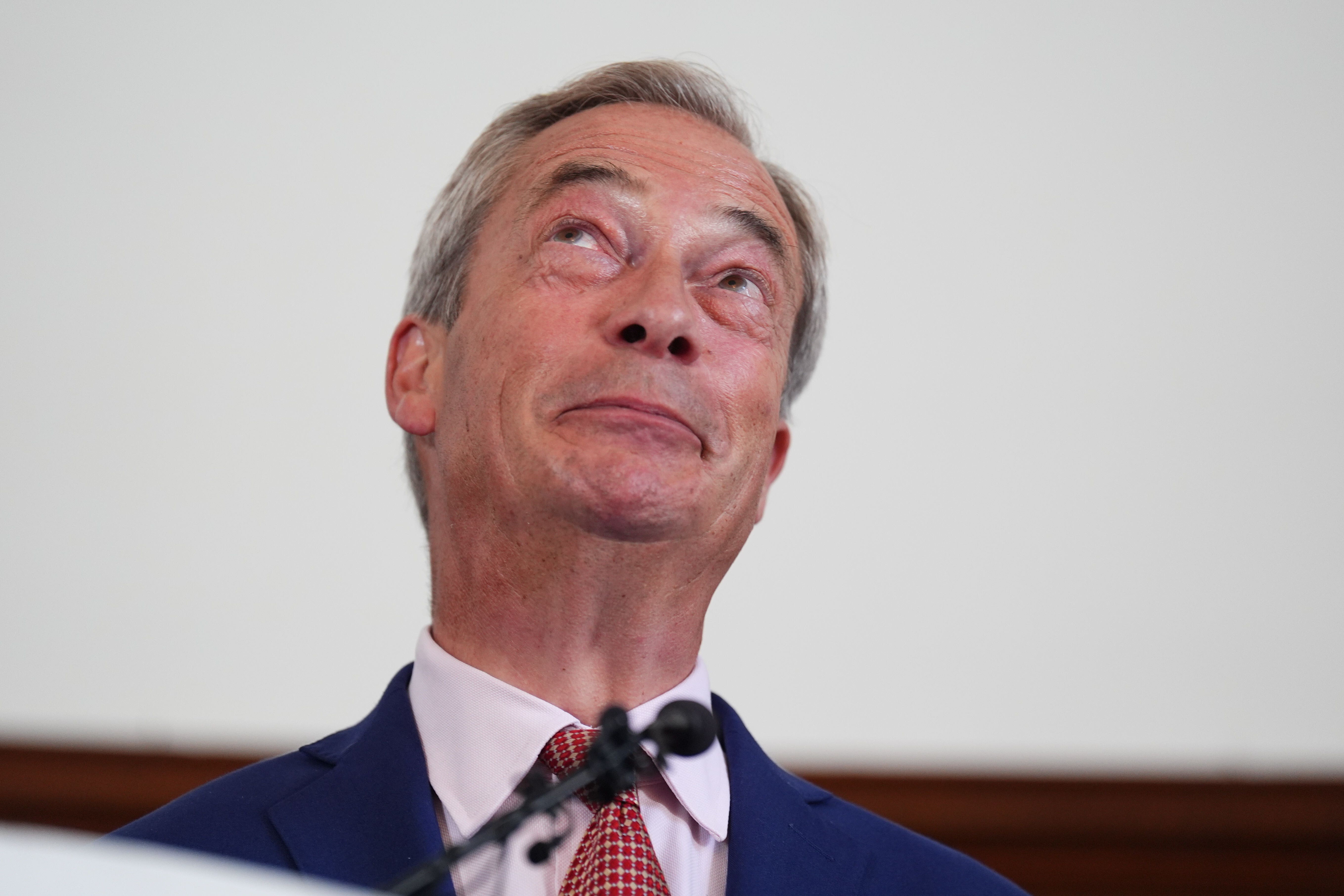 Reform UK leader Nigel Farage speaks to the media during a press conference