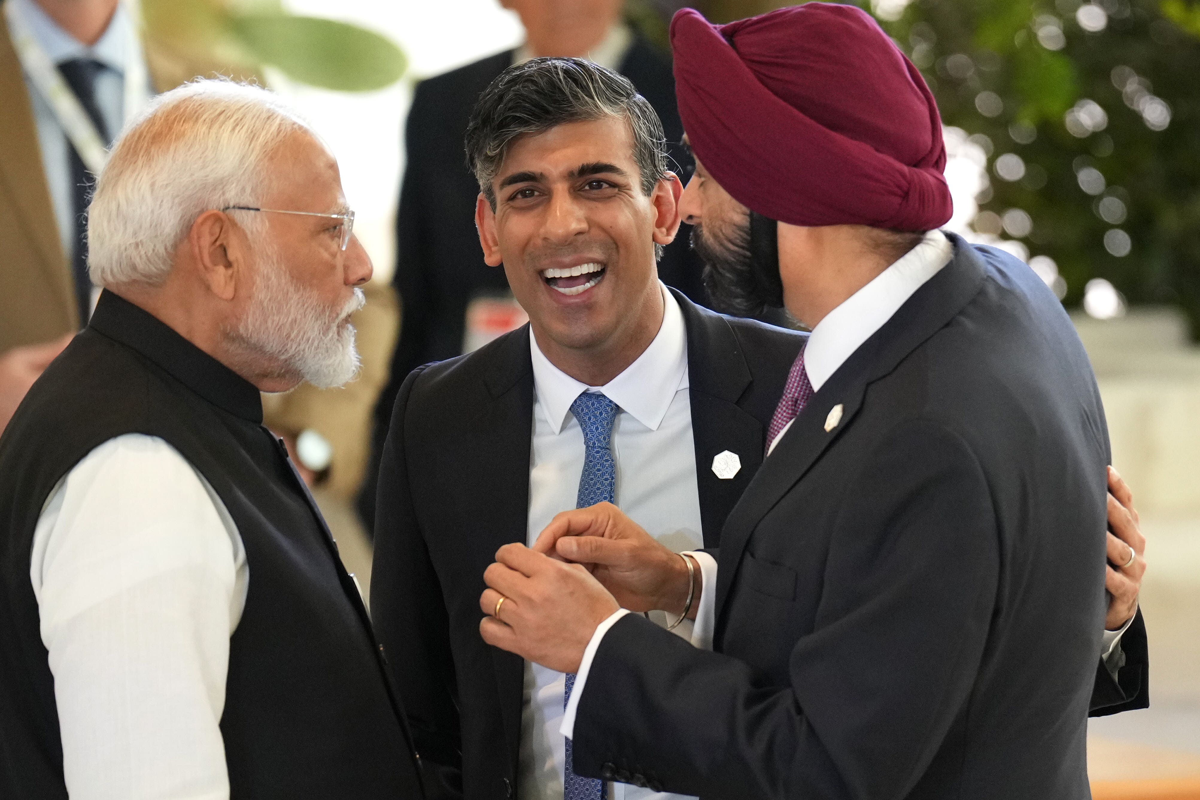 Left to right, Prime Minister of India Narendra Modi, Prime Minister Rishi Sunak and president of the World Bank Ajay Banga during the G7 leaders’ summit at the Borgo Egnazia resort in Puglia, Apulia, Italy (Christopher Furlong/PA)