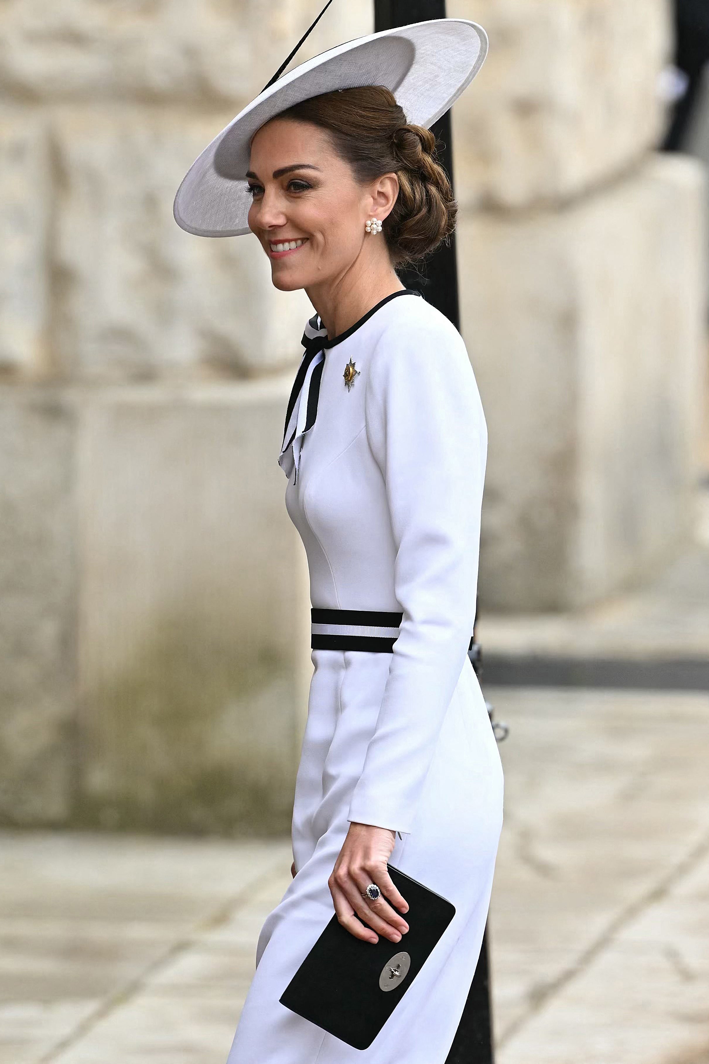 Kate returned to public duties in a striking white dress