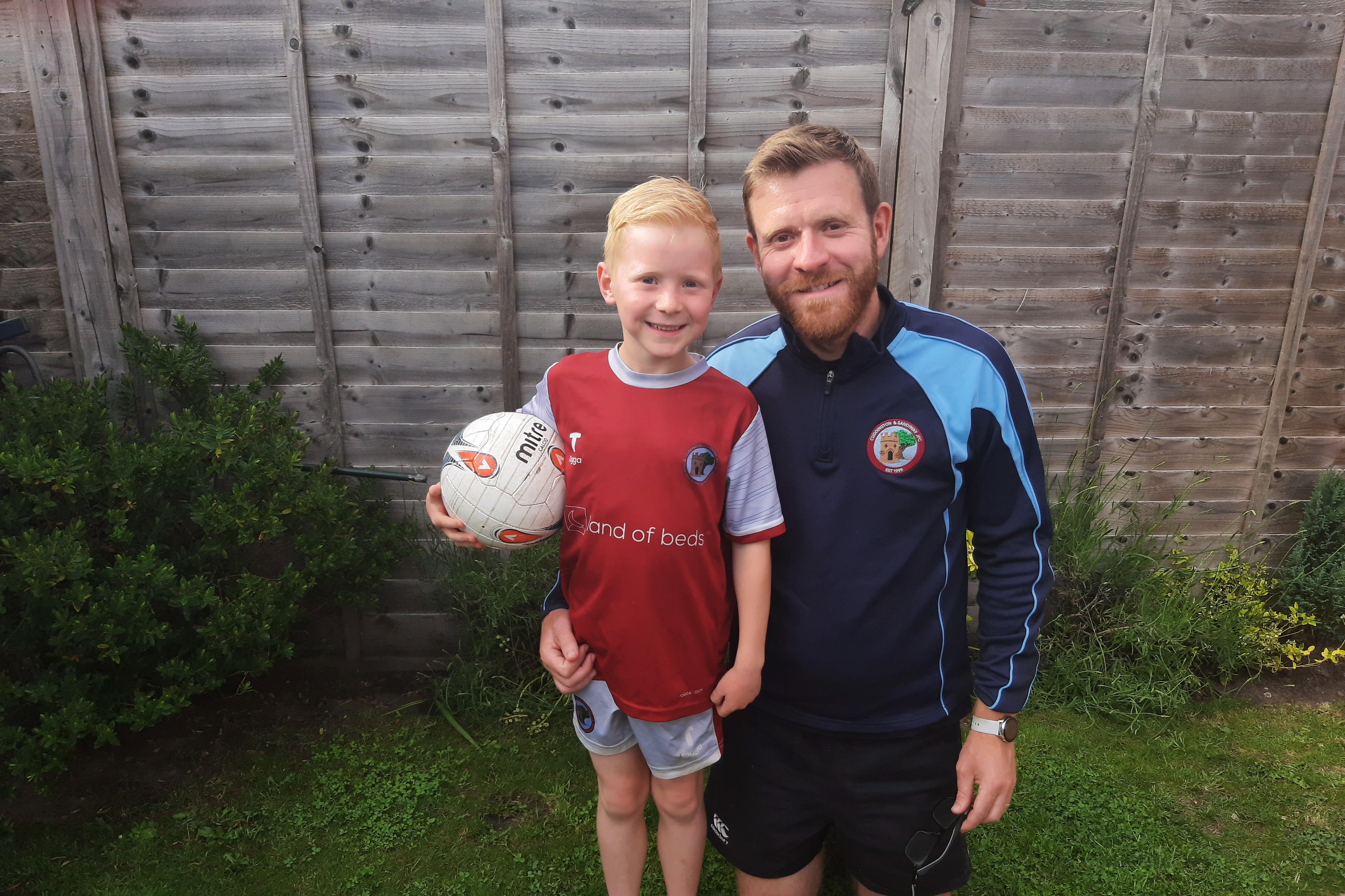 Ben Jones, a football coach in Cuddington, raised money for a defibrillator with his son, Oscar, after Danish footballer Christian Eriksen’s collapse in 2021 (Ben Jones/PA)