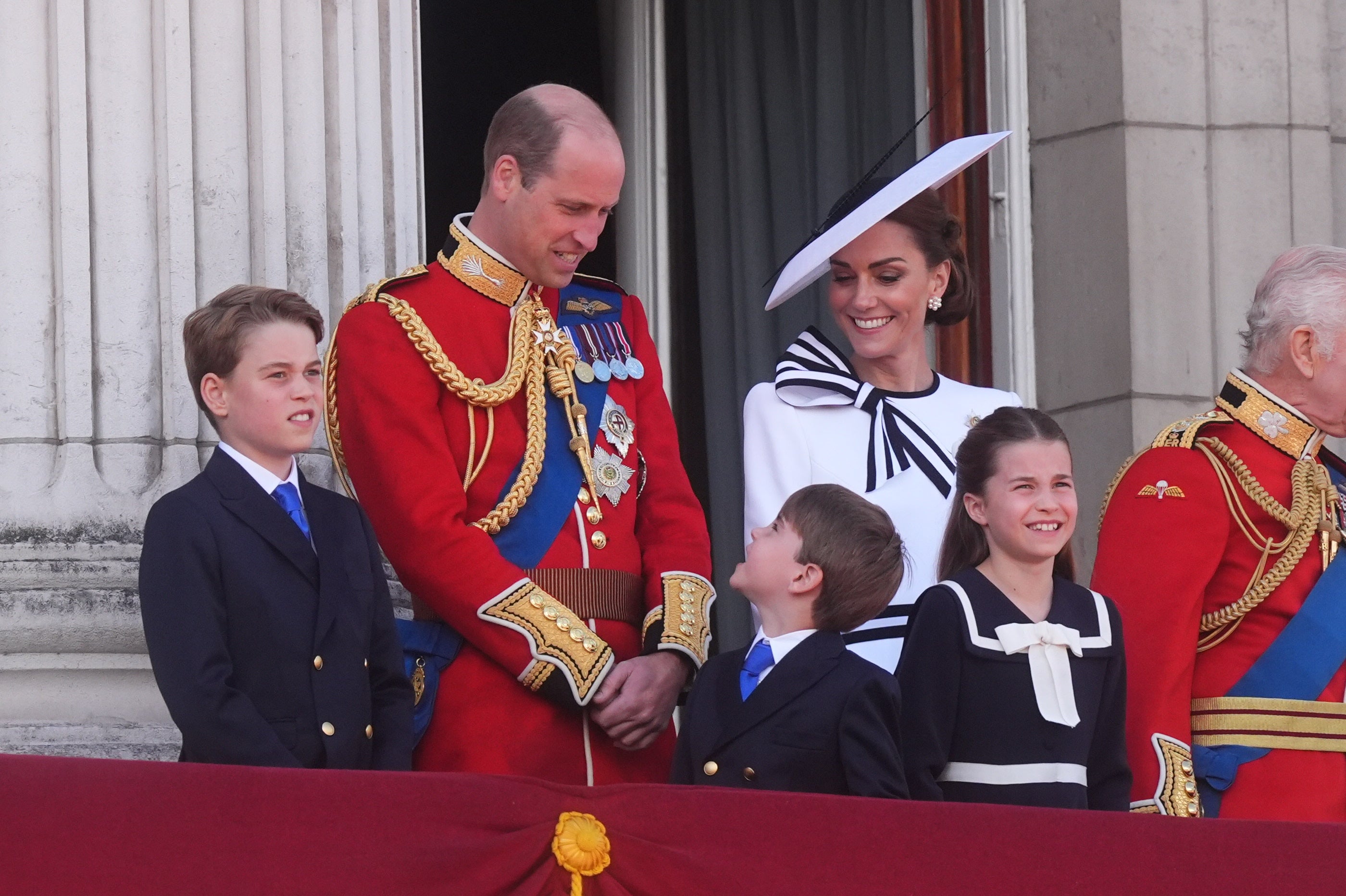 The princess looked cheerful as she was joined by husband, William and her three children