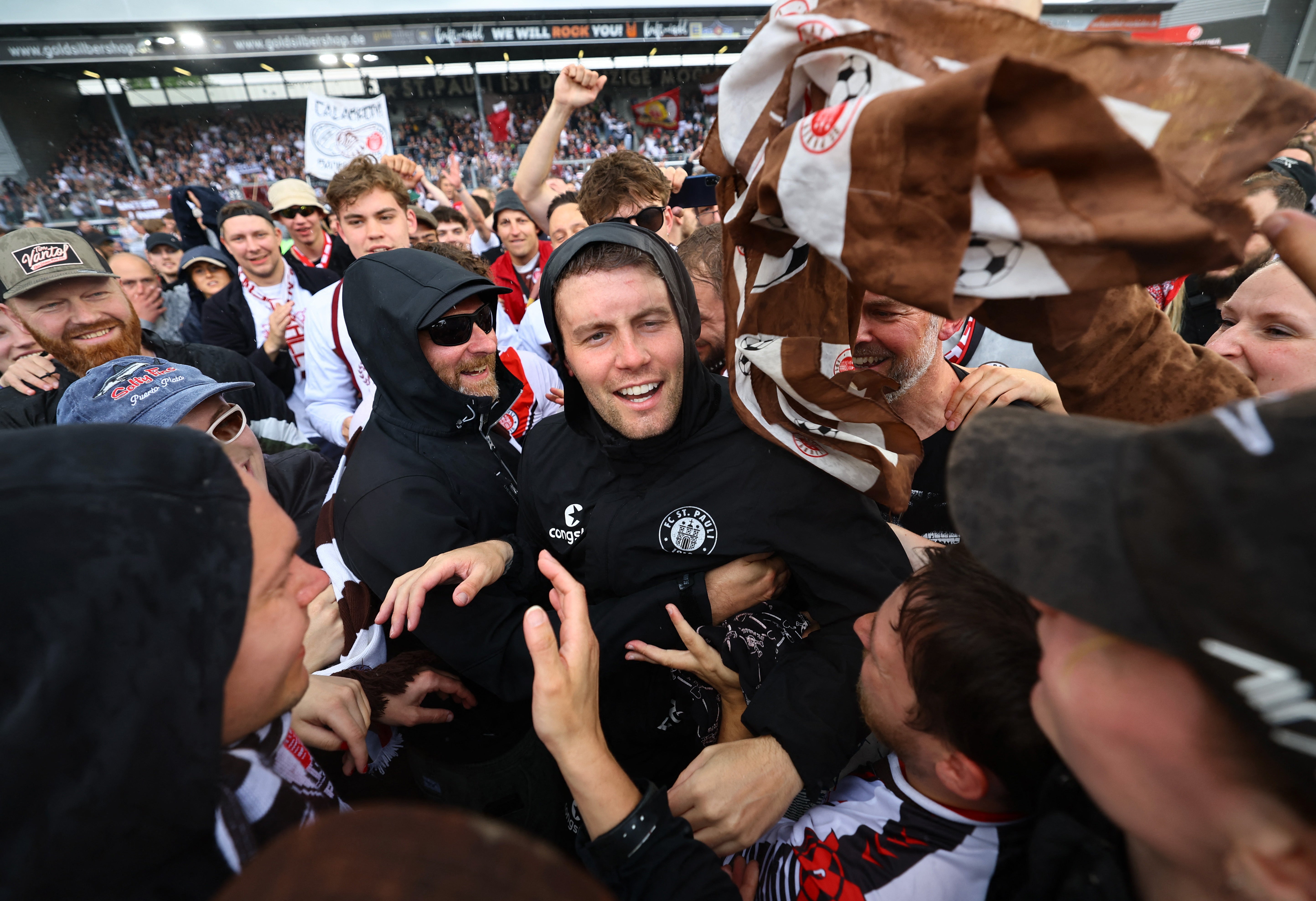 St. Pauli coach Fabian Hurzeler celebrates winning the 2. Bundesliga