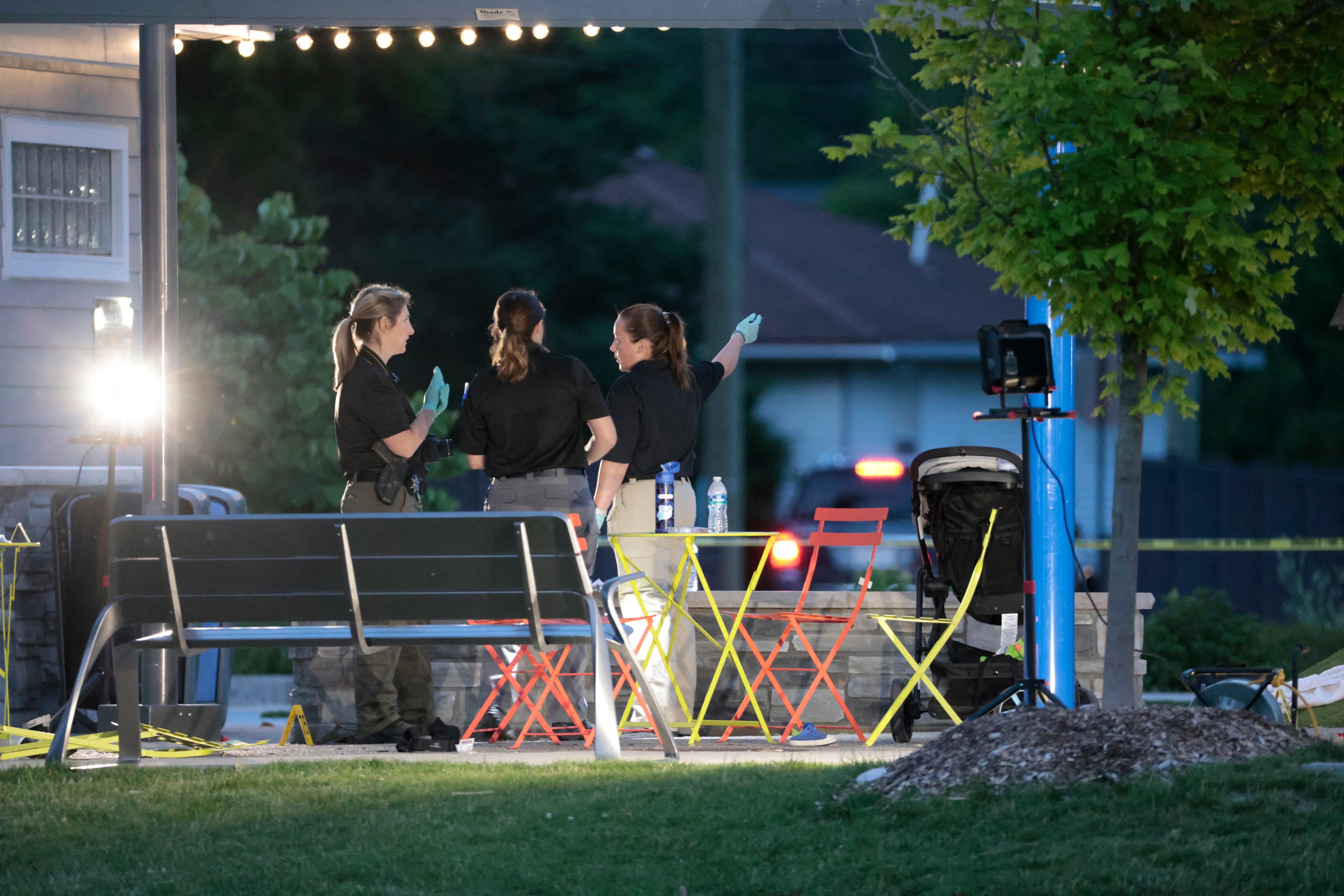 Oakland County Sheriff evidence technicians document the scene where the shooting took place