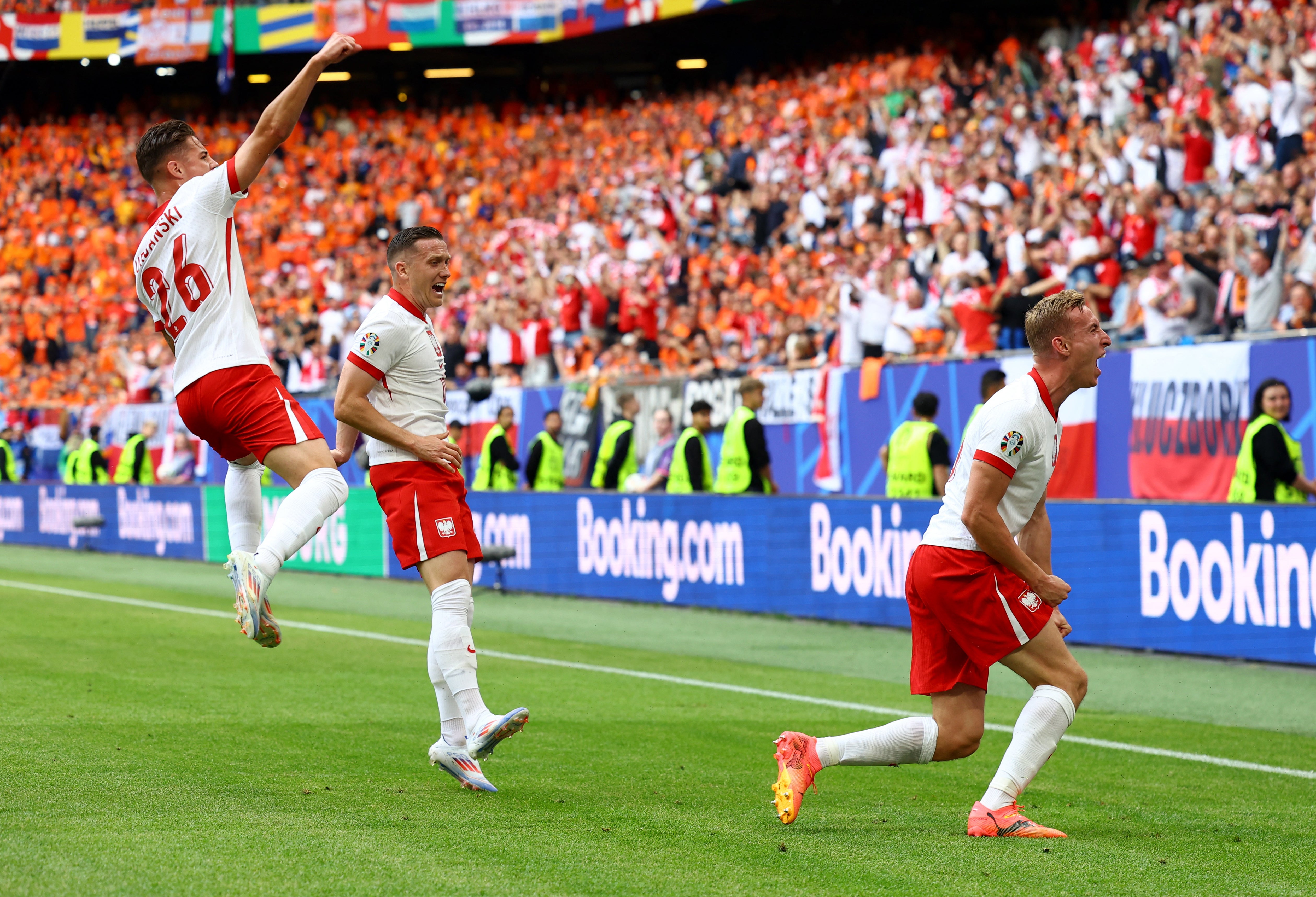 Buksa celebrates his opener for Poland