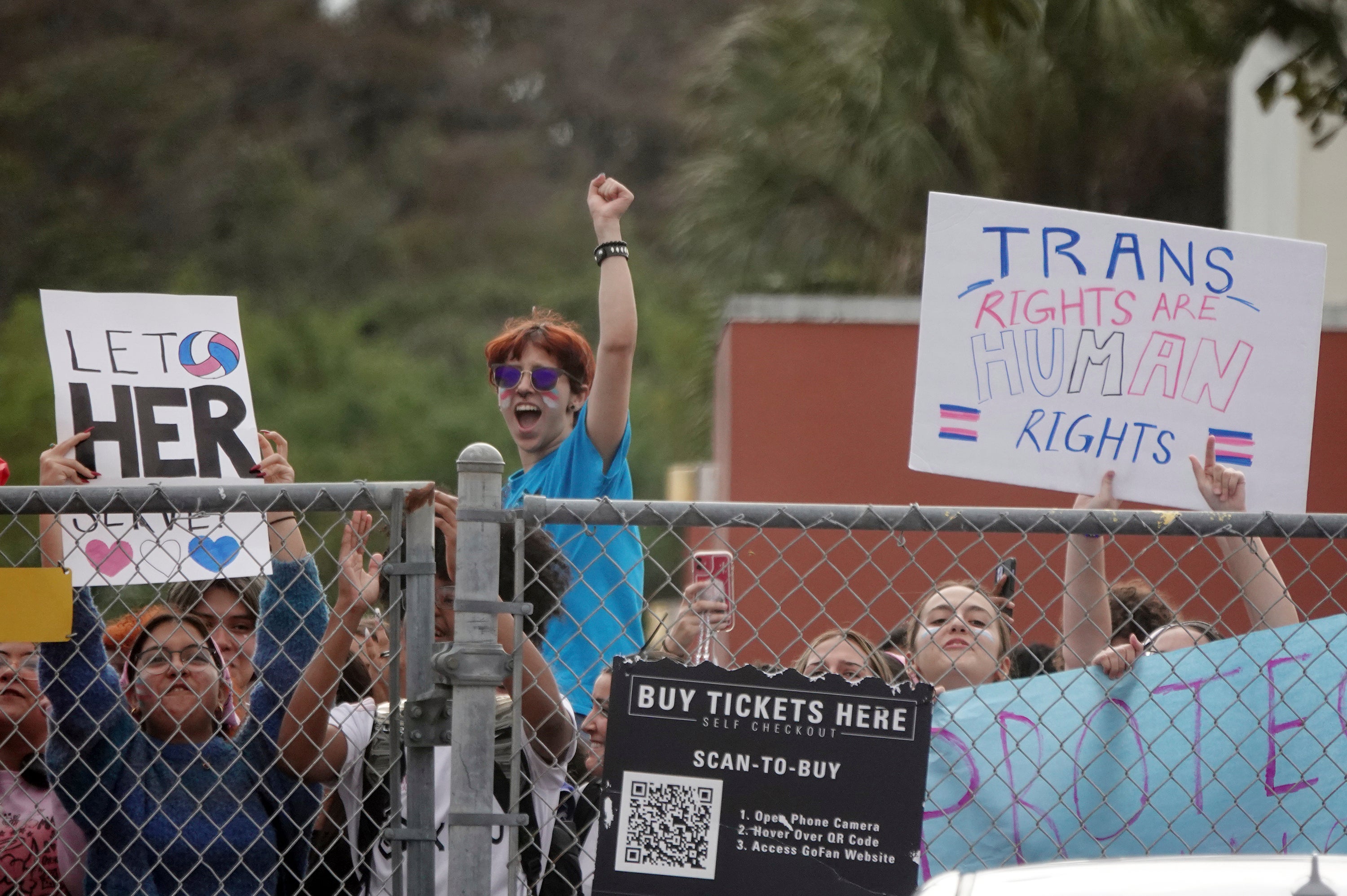 Students from Monarch High School in Coconut Creek, Florida, stage a walk out in protest of policies targeting transgender students. Federal judges this month have sided with Republican attorneys general suing the Biden administration over protections for LGBT+ students.