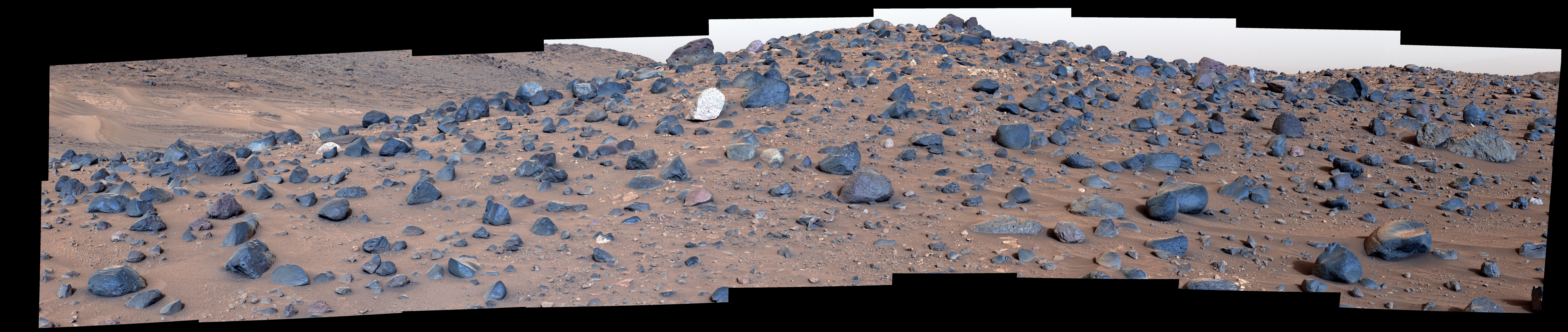 Stitched together from 18 images taken by NASA’s Perseverance rover, this mosaic shows a boulder field on ‘Mount Washburn’ on May 27