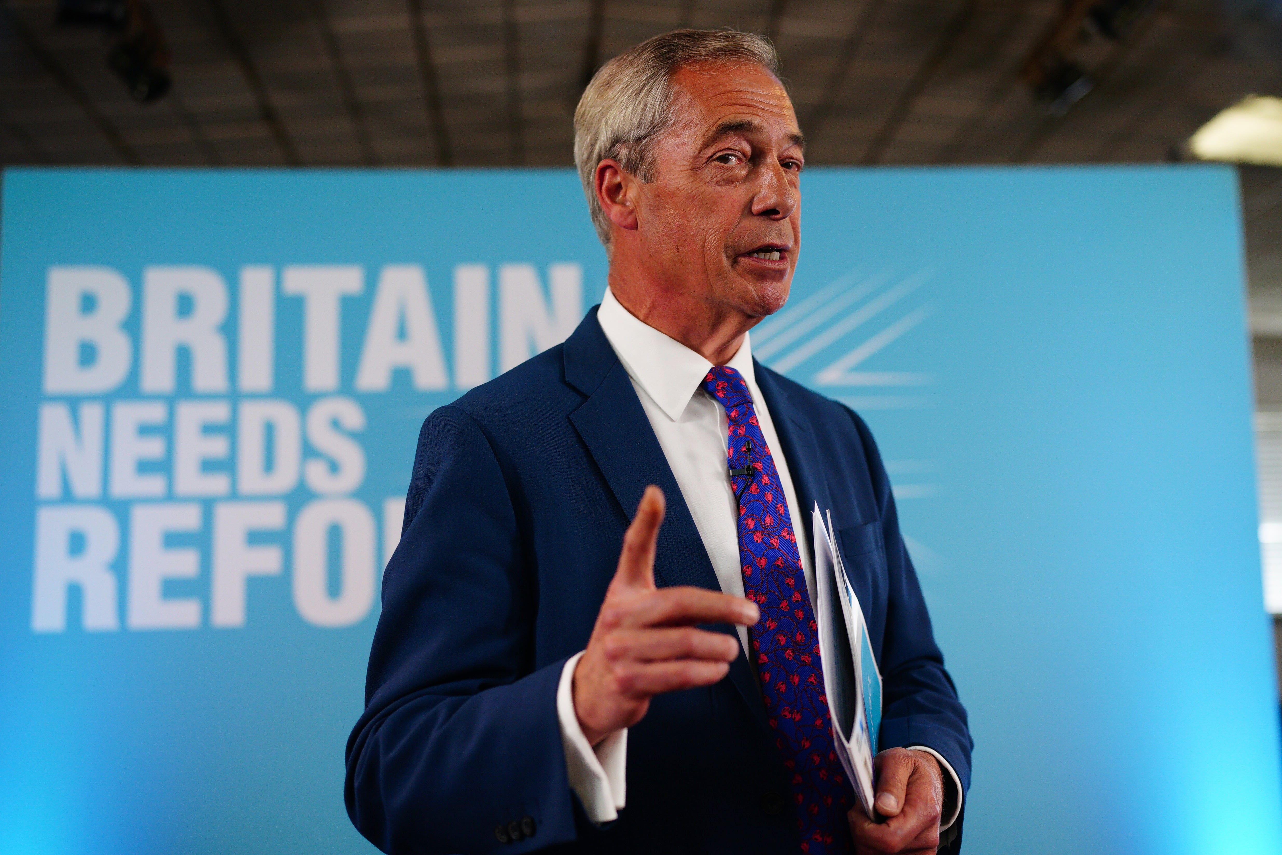 Nigel Farage has claimed Reform UK is the victim of an ‘establishment stitch-up’ as the party considers suing a firm it contracted to vet candidates (Ben Birchall/PA)