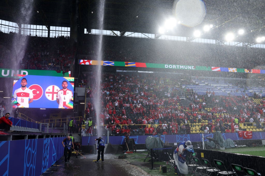 Rain plunges from the roof inside Dortmund’s leaking stadium