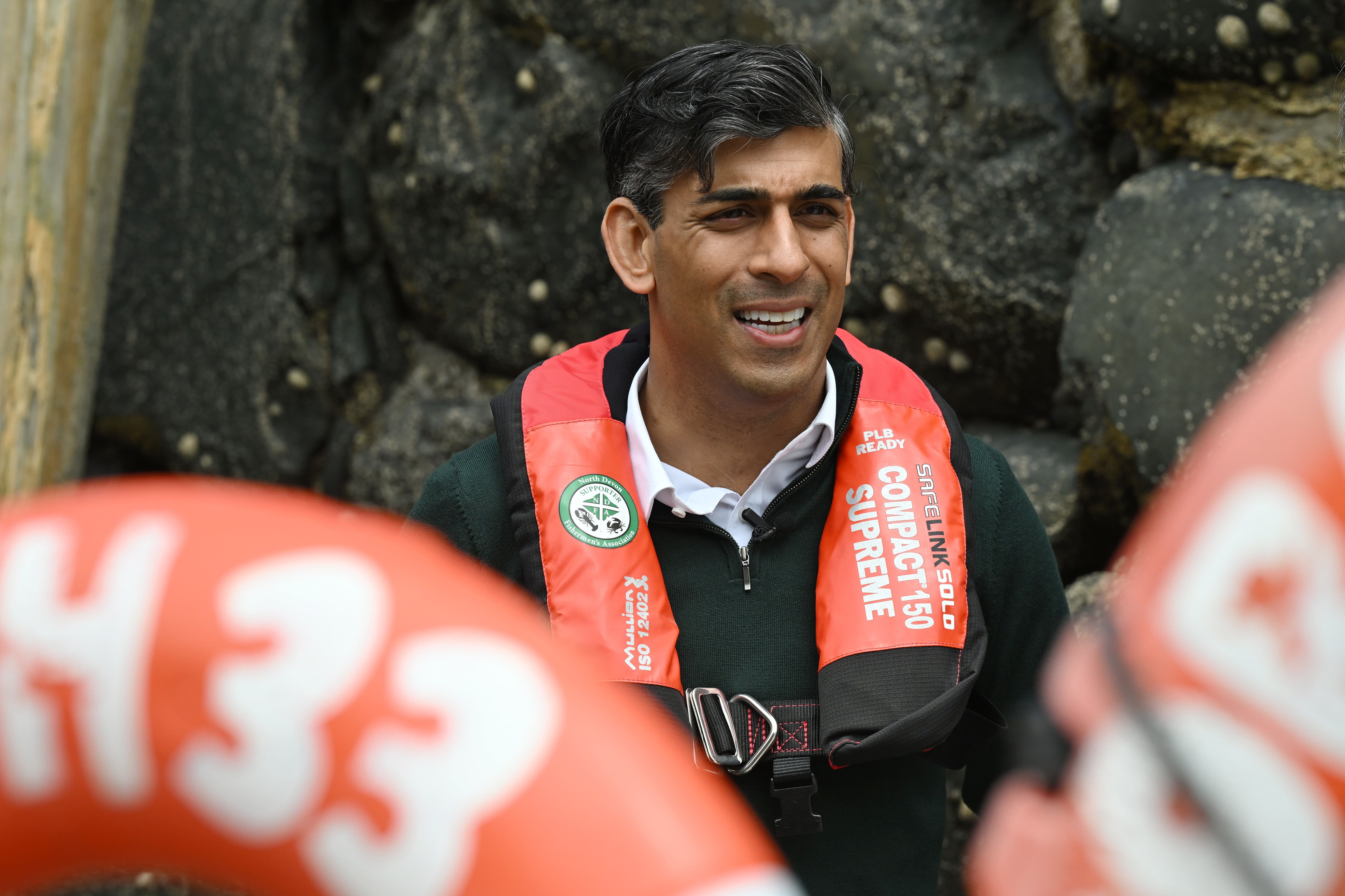 Prime Minister Rishi Sunak during a campaign visit to Clovelly in North Devon (Leon Neal/PA)