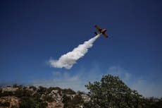 Huge blaze closes town near Athens as Greece prepares for wildfire season