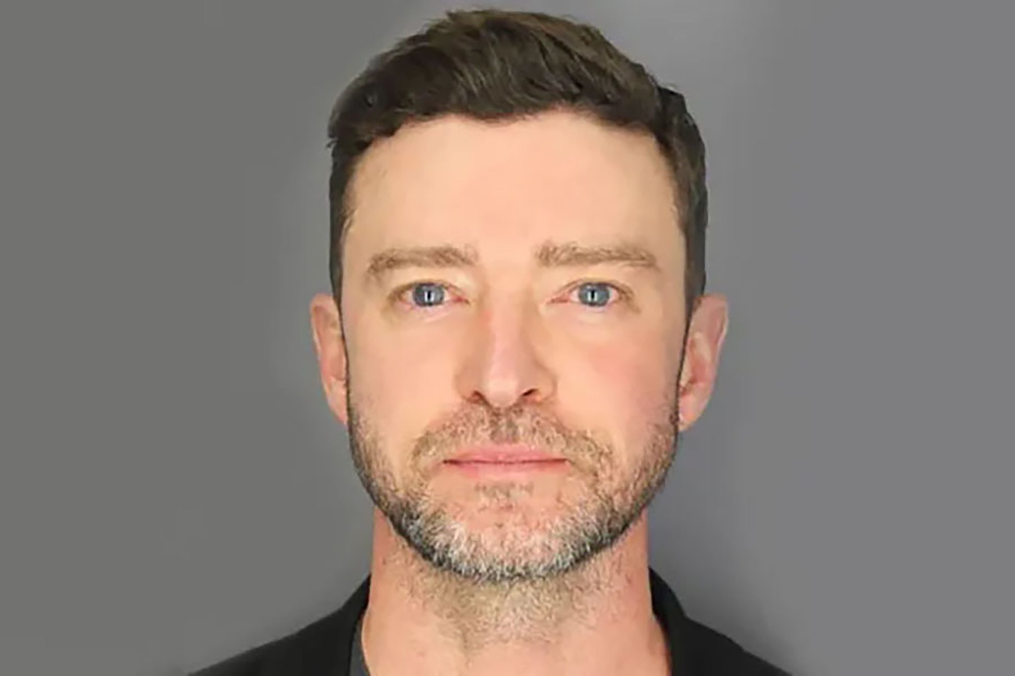 Pale and mortified: Timberlake’s mugshot following his arrest